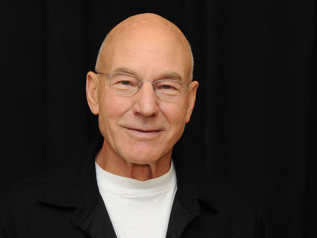Patrick Stewart, black backdrop, bald man, SD Desktop Wallpaper