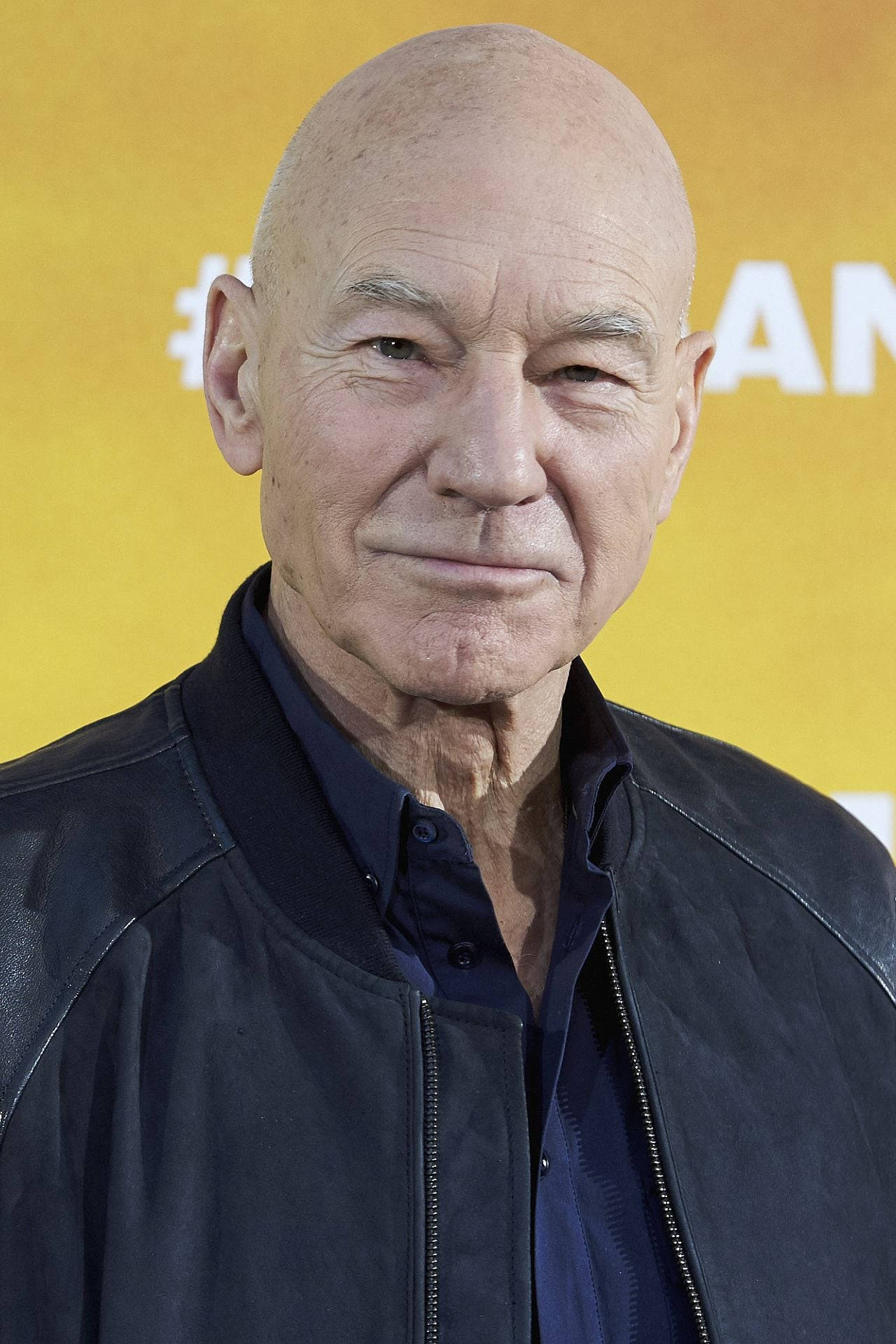 Patrick Stewart, bald man, dark leather jacket, Full HD Phone Wallpaper
