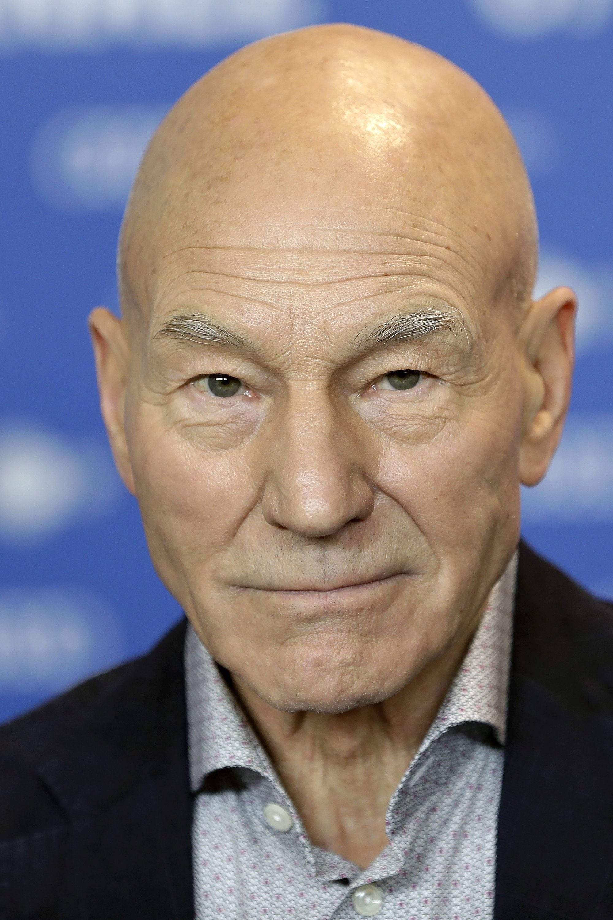 Patrick Stewart, bald head, serious expression, 2K Phone Wallpaper