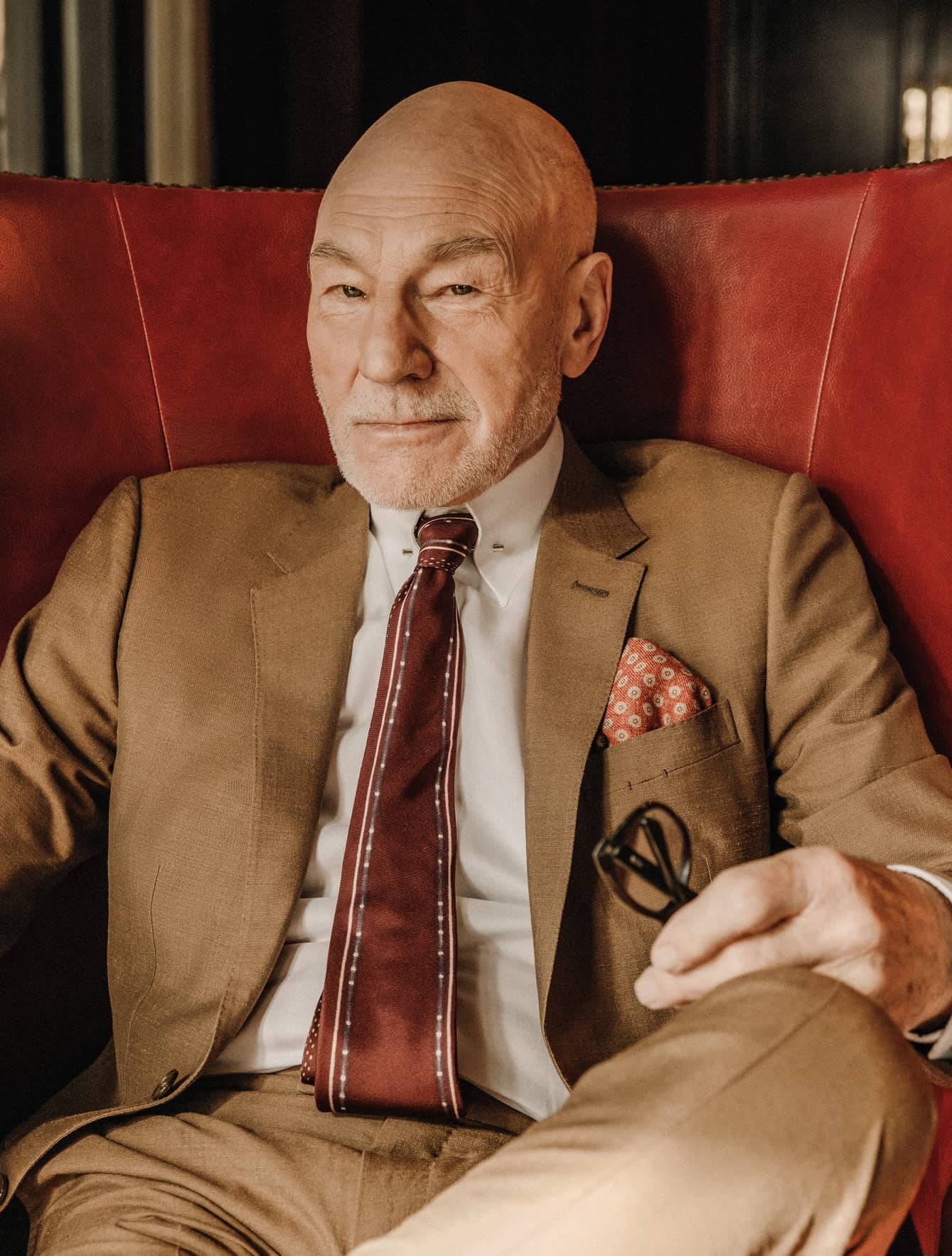 Patrick Stewart, red couch, tan suit, HD Phone Wallpaper