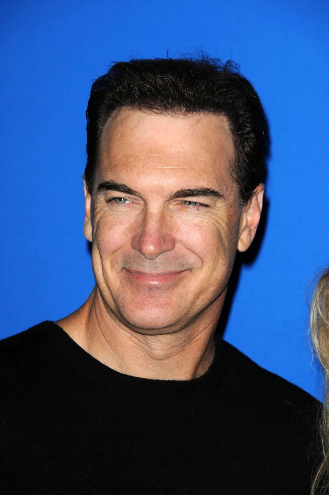 Patrick Warburton, black shirt, solid blue background, HD Phone Wallpaper