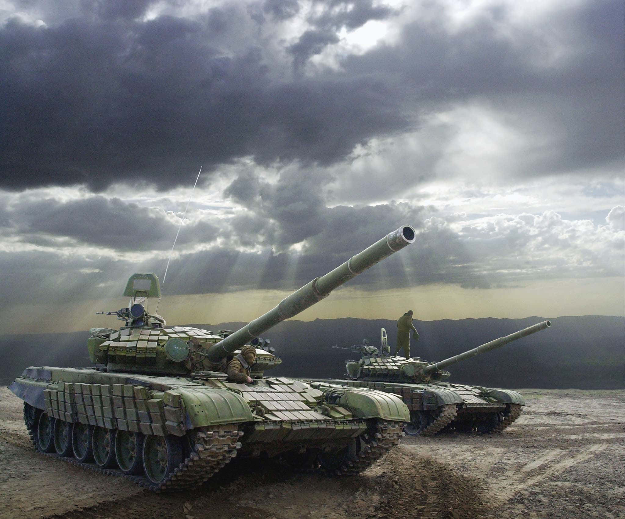 olive green tanks, muddy field, dramatic cloudy sky, Full HD Desktop Wallpaper