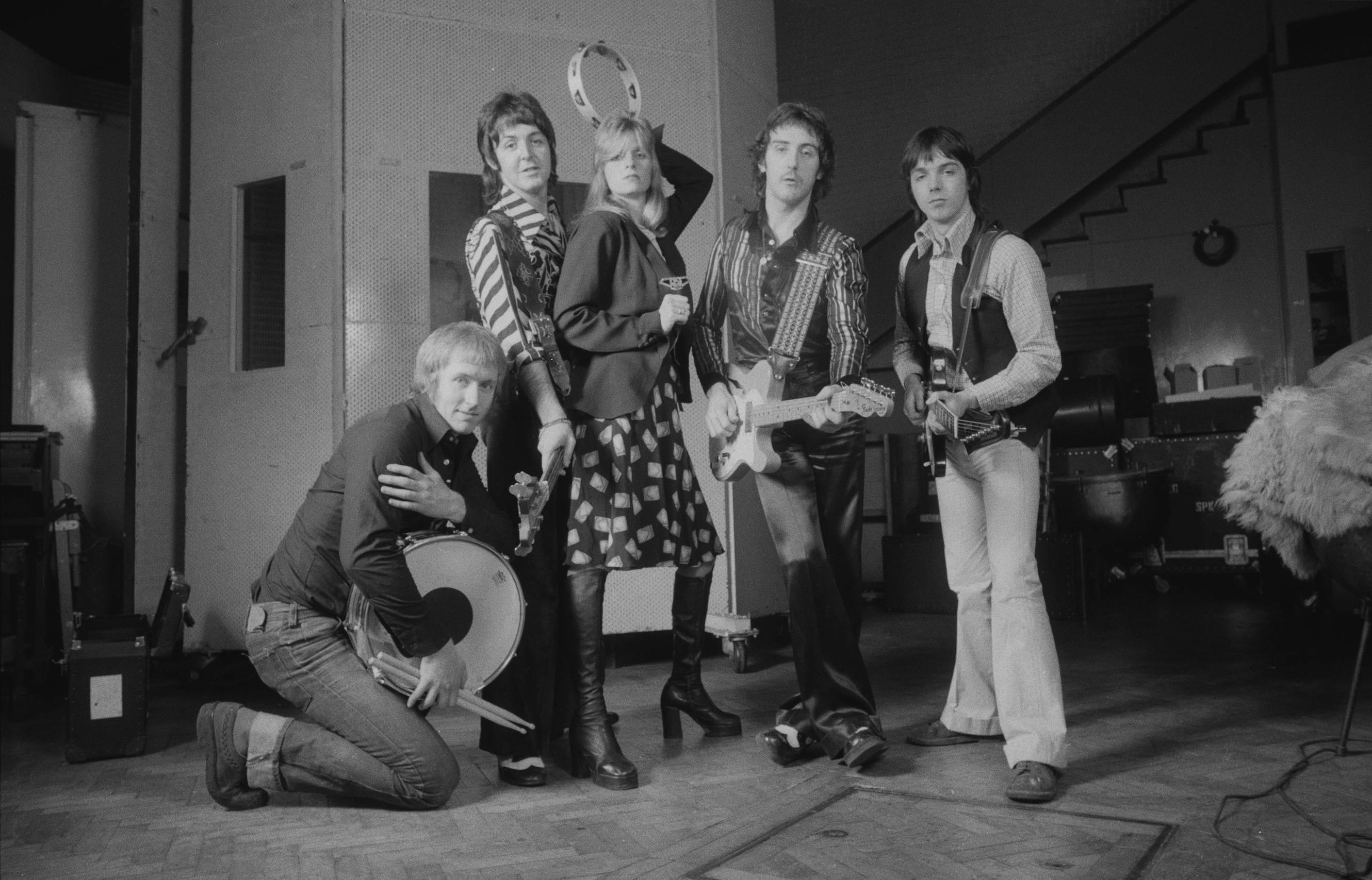 Paul McCartney And Wings, rock band, backstage studio setting, 2K Desktop Wallpaper