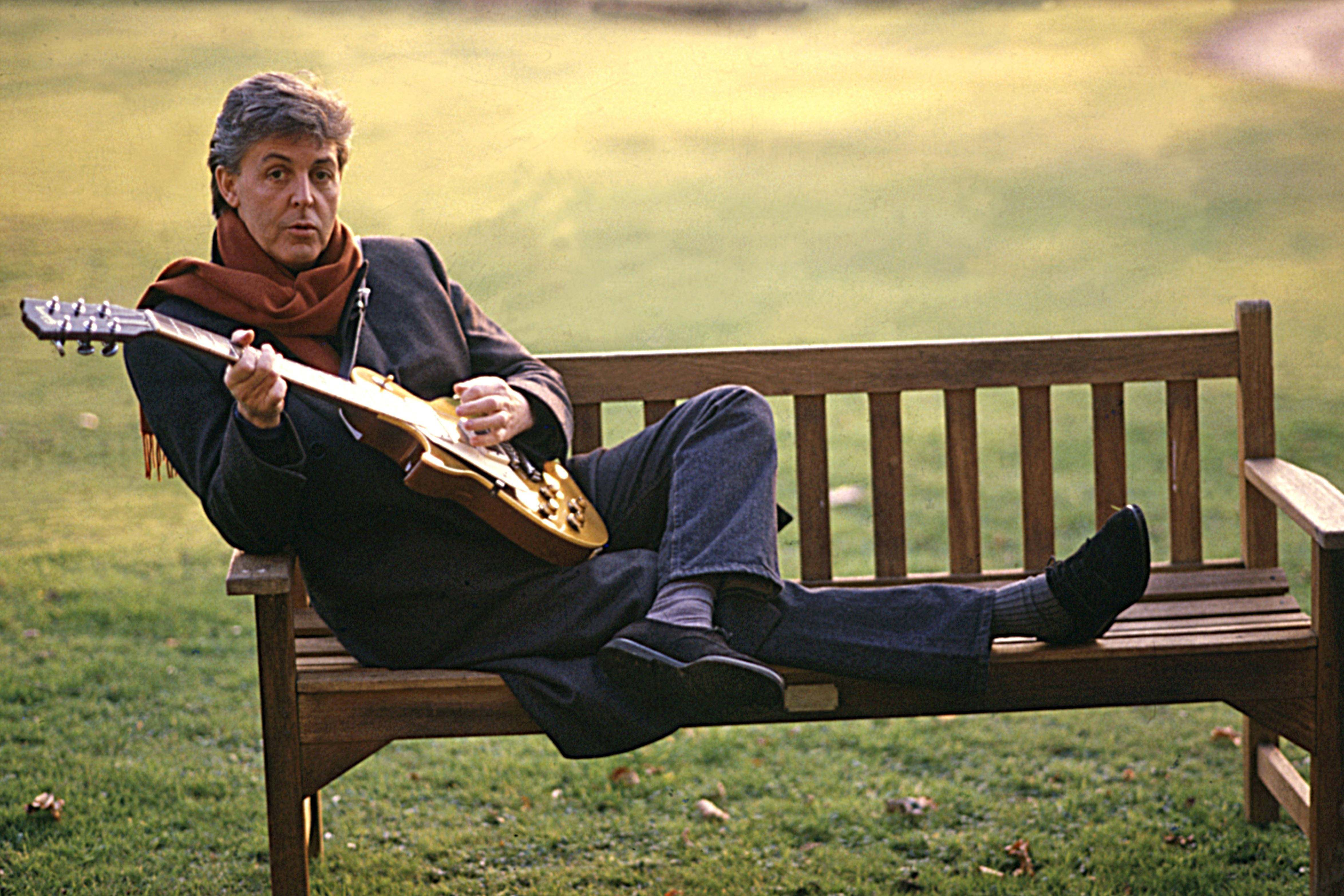 Paul McCartney, golden electric guitar, wooden bench, 4K Desktop Wallpaper