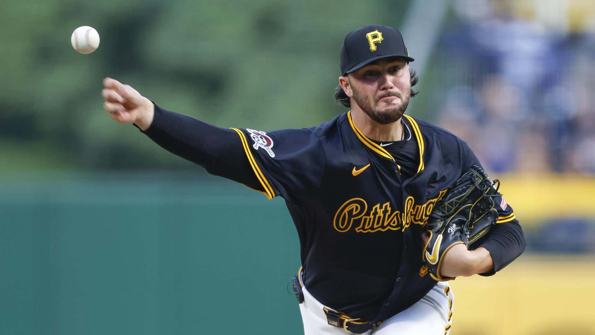 Paul Skenes, black and gold Pittsburgh uniform, baseball pitcher, Full HD Desktop Wallpaper
