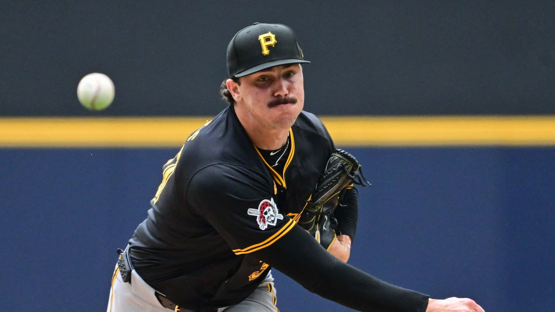 Paul Skenes, black and gold uniform, white baseball, Full HD Desktop Wallpaper