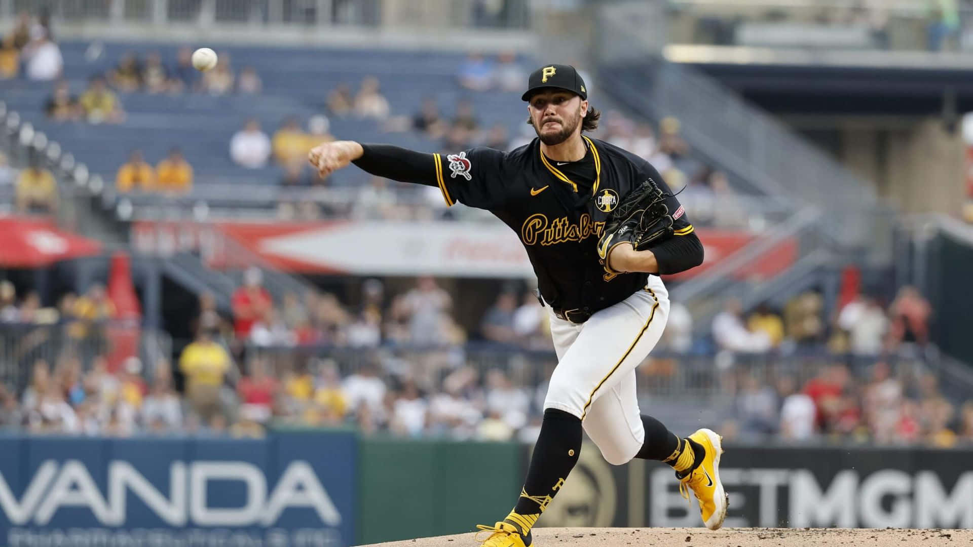 Paul Skenes, black and gold uniform, sunlit mound, Full HD Desktop Wallpaper