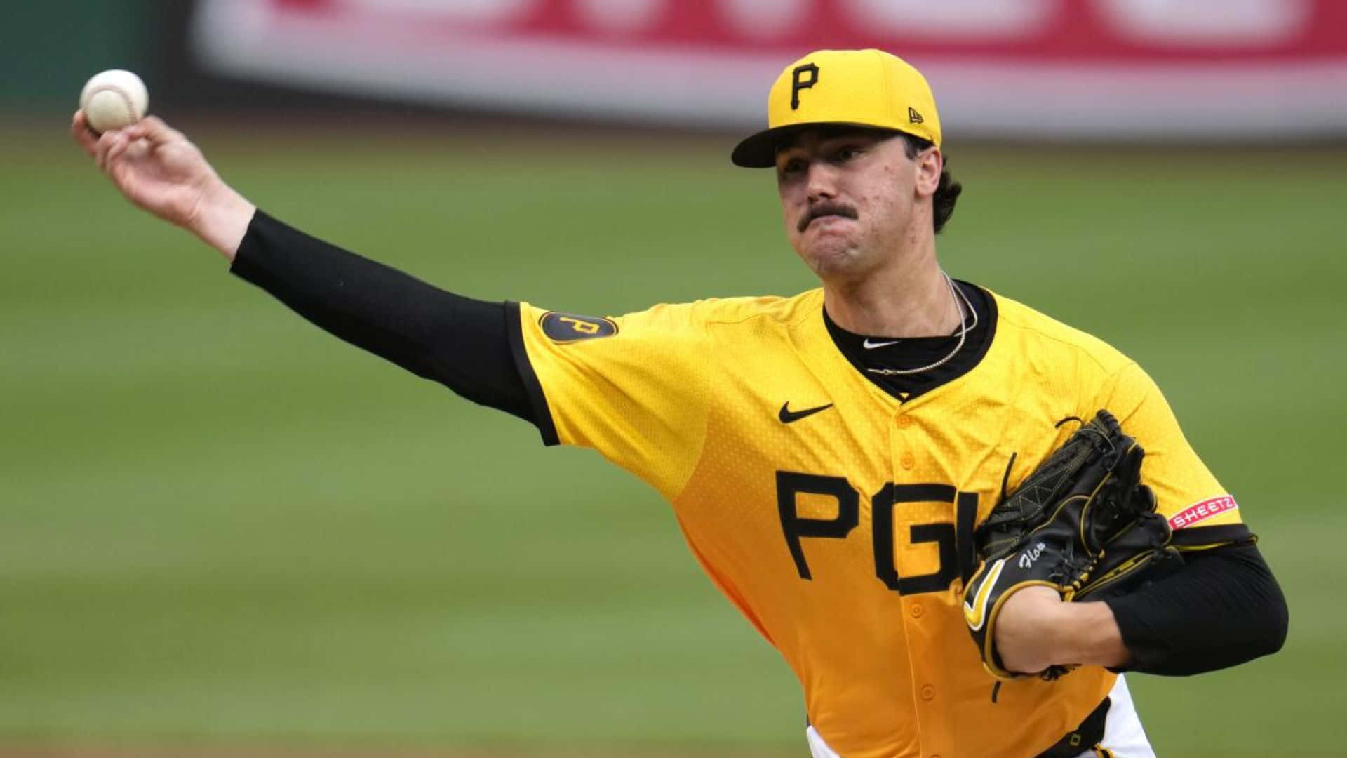 Paul Skenes, yellow and black uniform, green field, Full HD Desktop Wallpaper