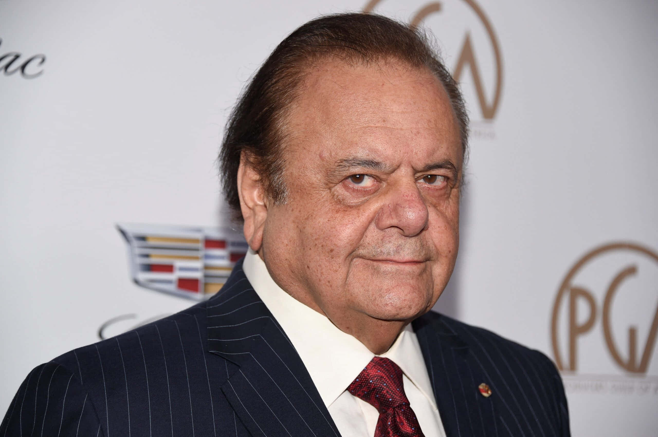 Paul Sorvino, dark pinstripe suit, red tie, 2K Desktop Wallpaper