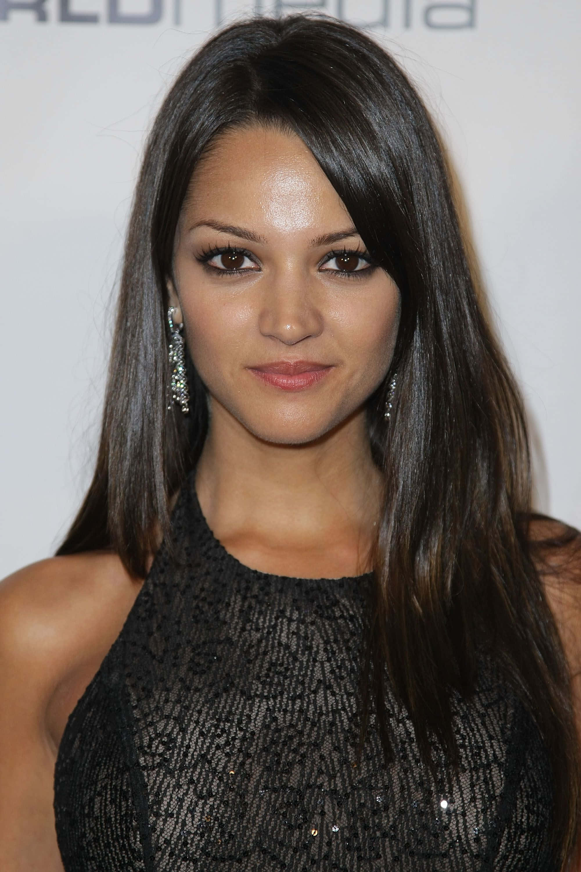 Paula Garcés, black textured dress, long dark hair, 2K Phone Wallpaper