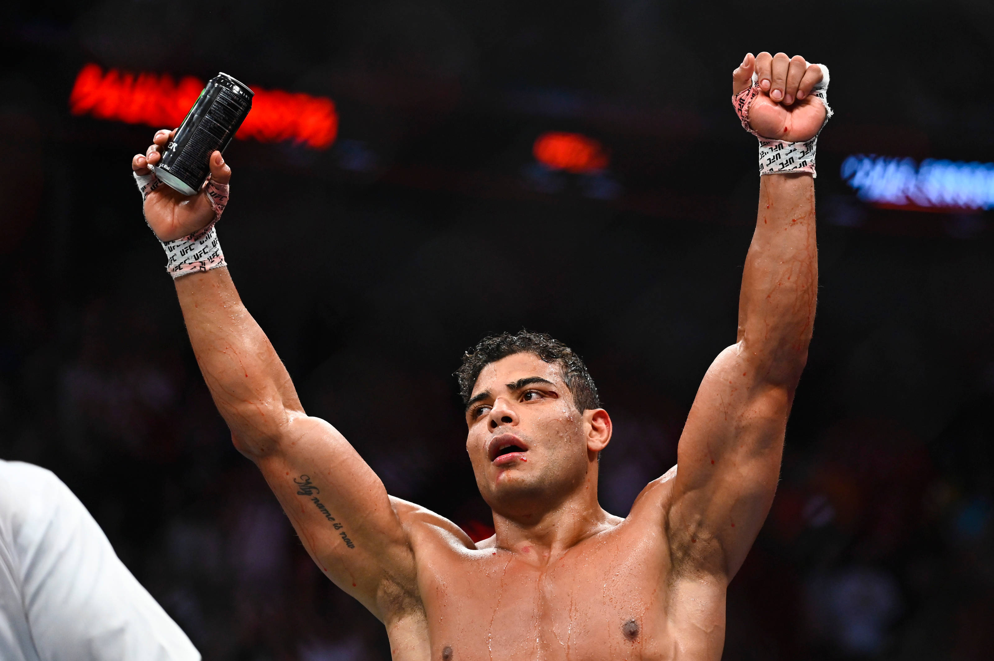Paulo Costa, raising hands in victory, arena lights, 2K Desktop Wallpaper
