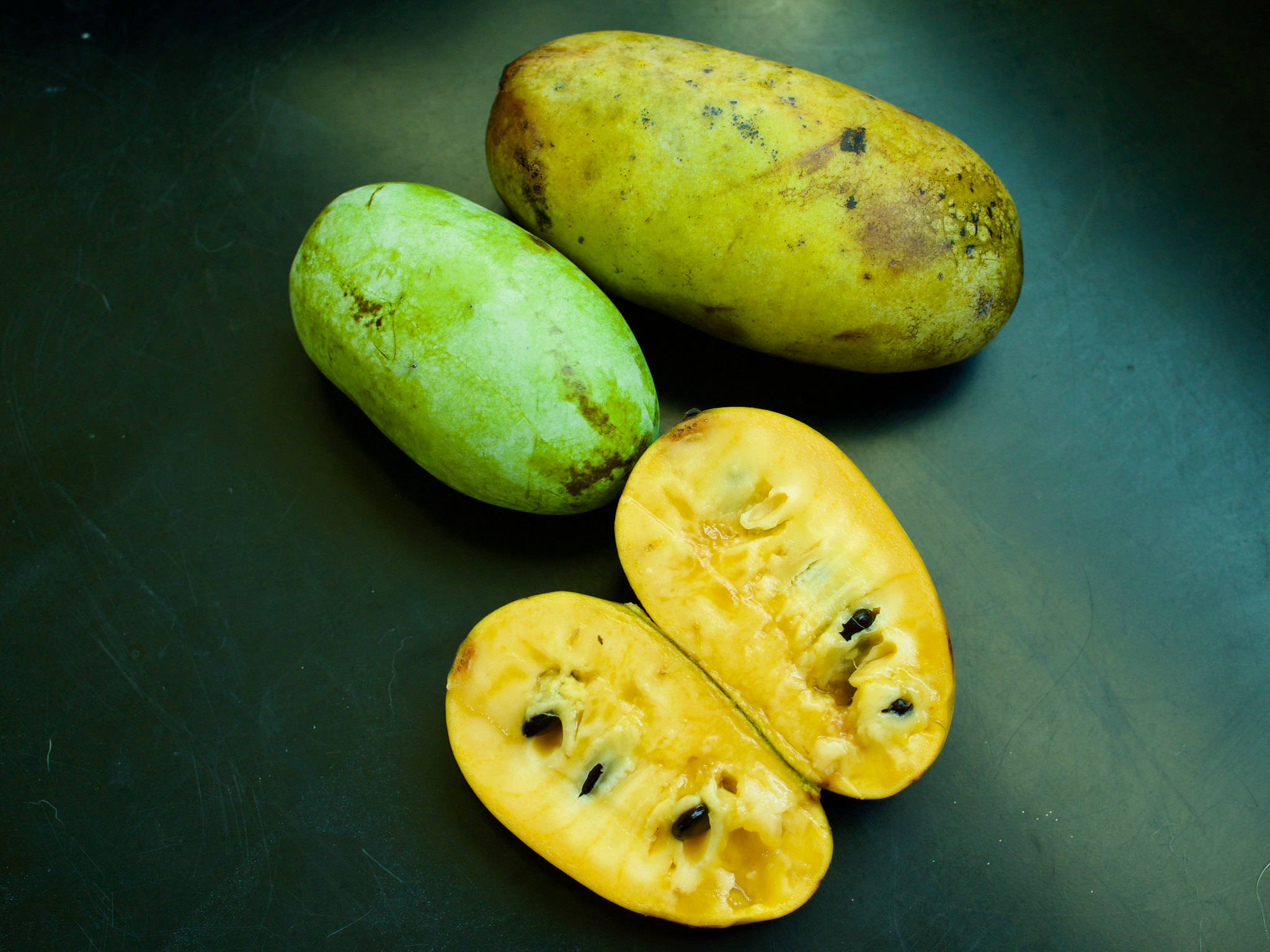 pawpaw fruit, dark surface, green, Full HD Desktop Wallpaper