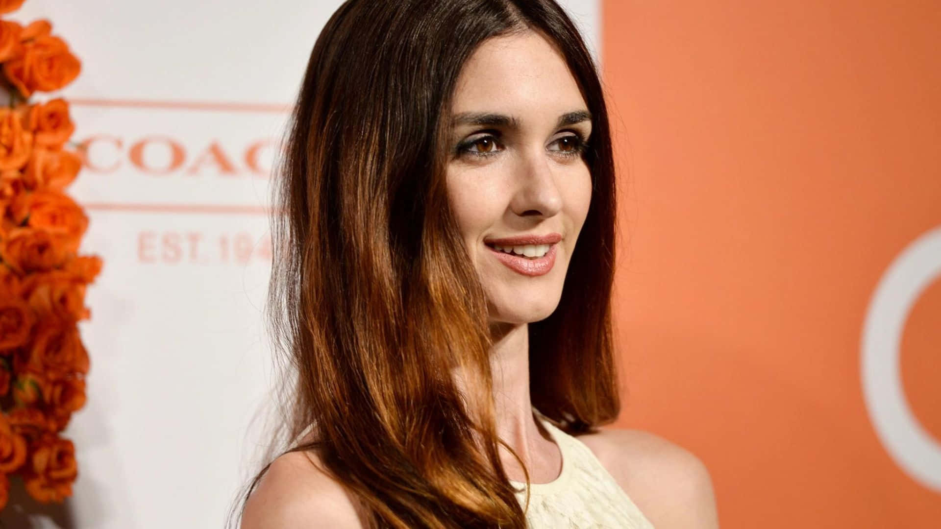 Paz Vega, long brown hair, orange floral decor, Full HD Desktop Wallpaper