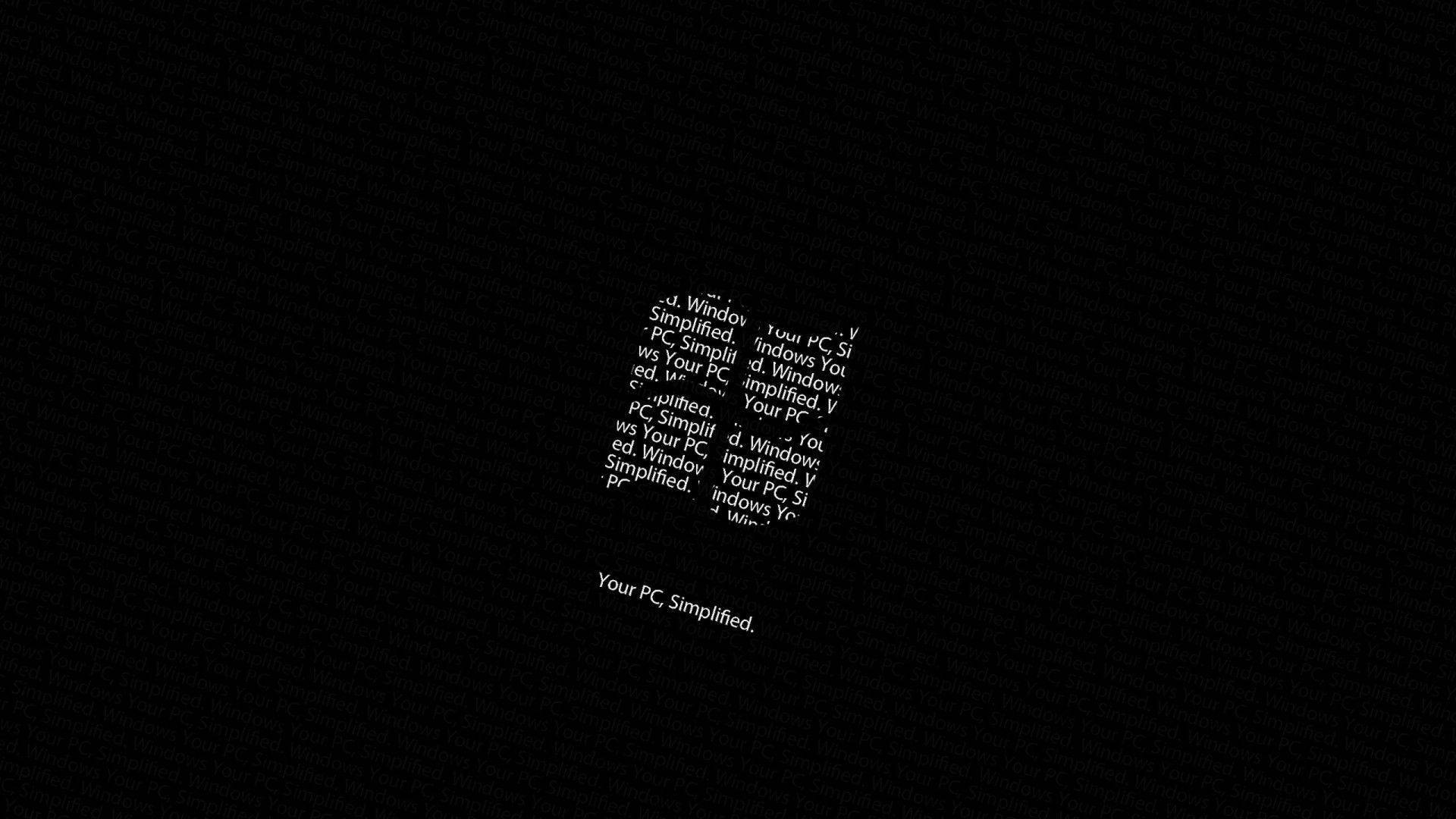 Your PC Simplified, minimalist black background, scattered white text fragments, Full HD Desktop Wallpaper
