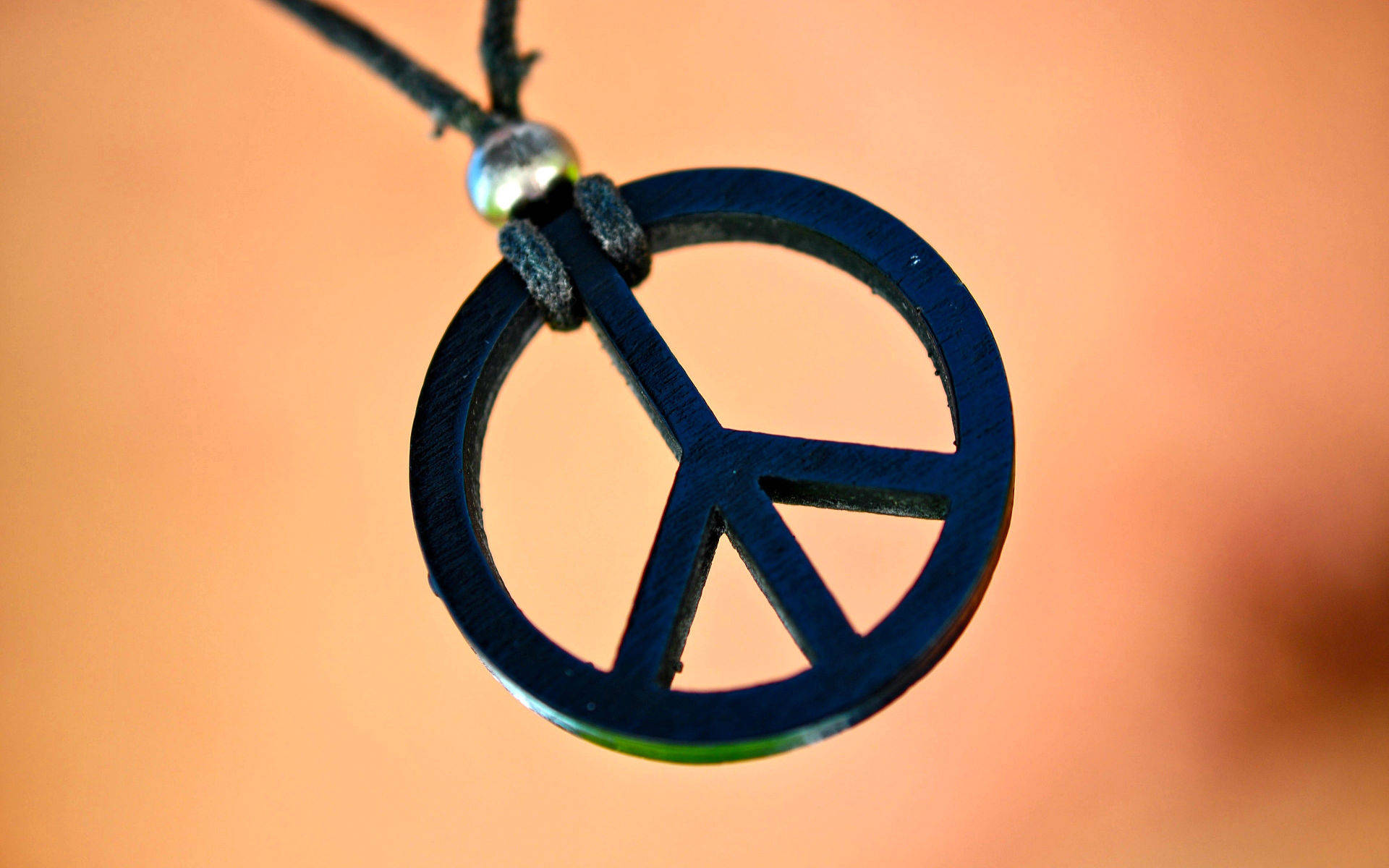 peace symbol pendant, black wooden, dark cord, Full HD Desktop Wallpaper