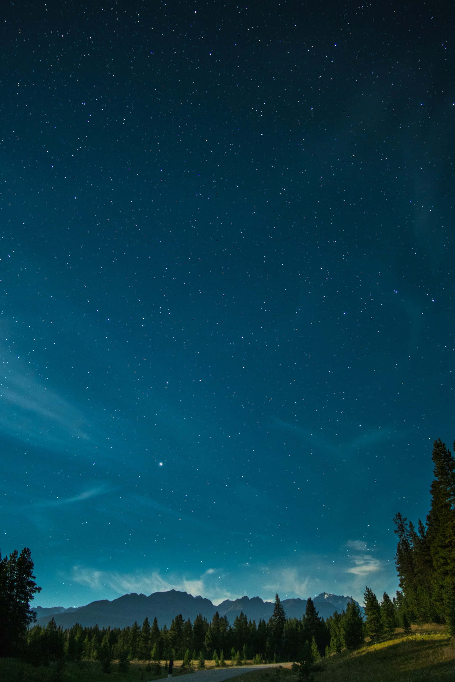 starry night sky, glowing auroras, dark mountain range, 2K Phone Wallpaper