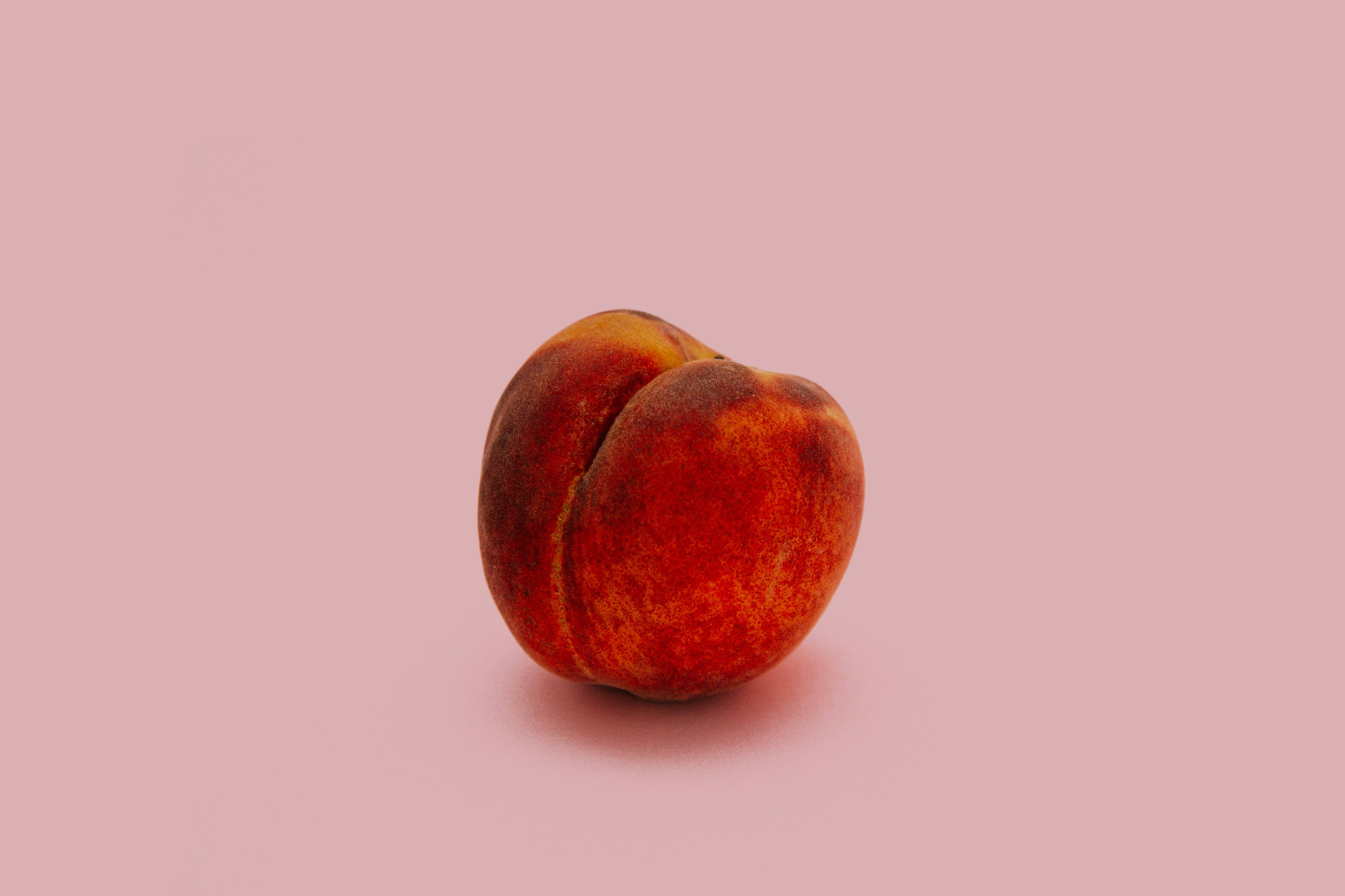 peach, warm orange and red hues, soft pink background, 5K Desktop Wallpaper
