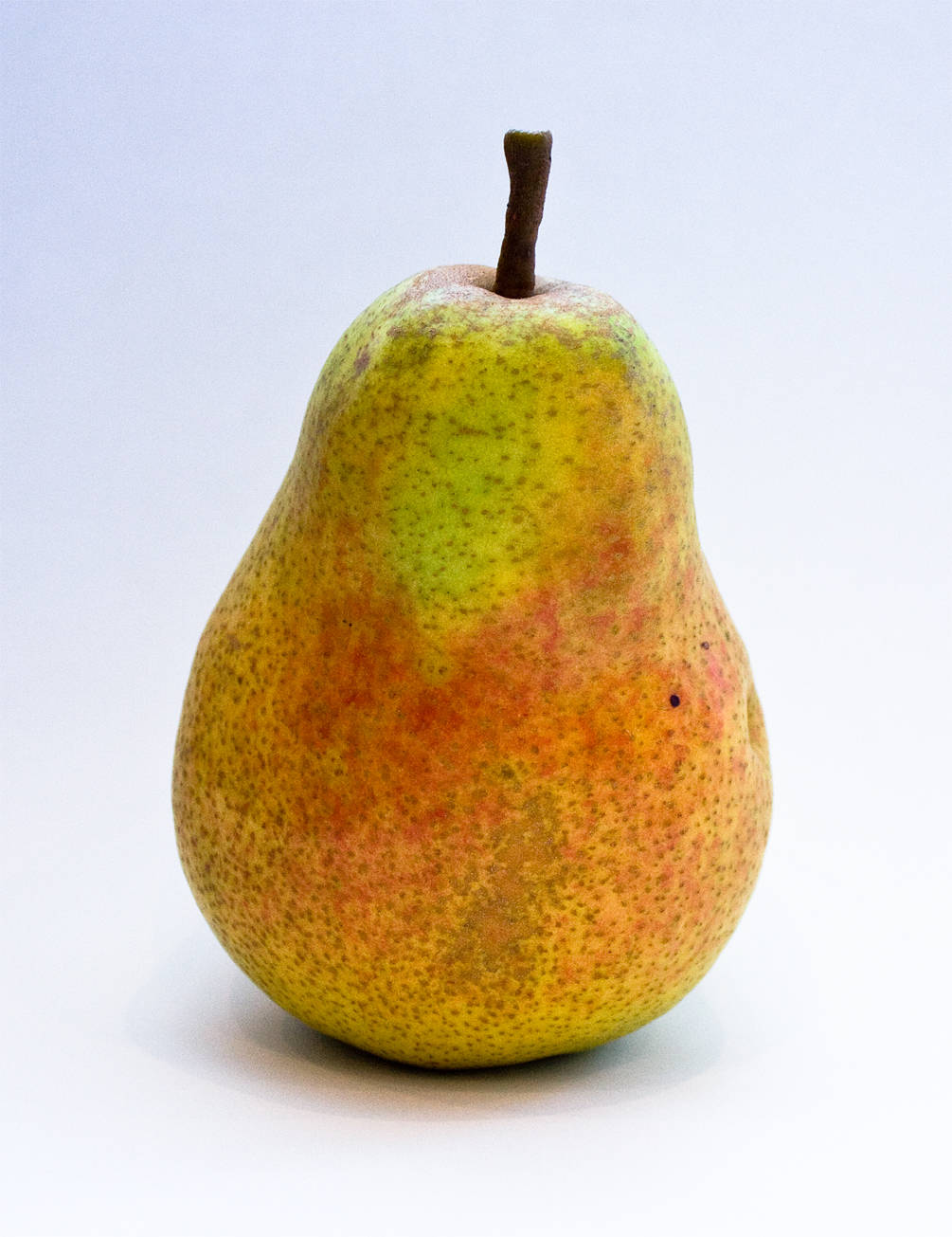 ripe pear, speckled yellow orange skin, brown stem, HD Phone Wallpaper