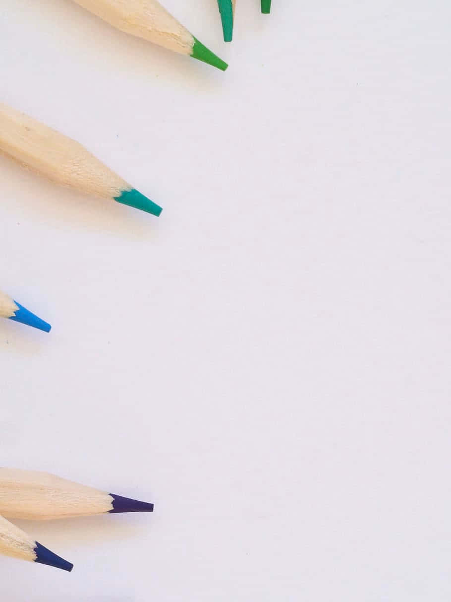 blue writing pencils, colored pencils, white surface, SD Phone Wallpaper