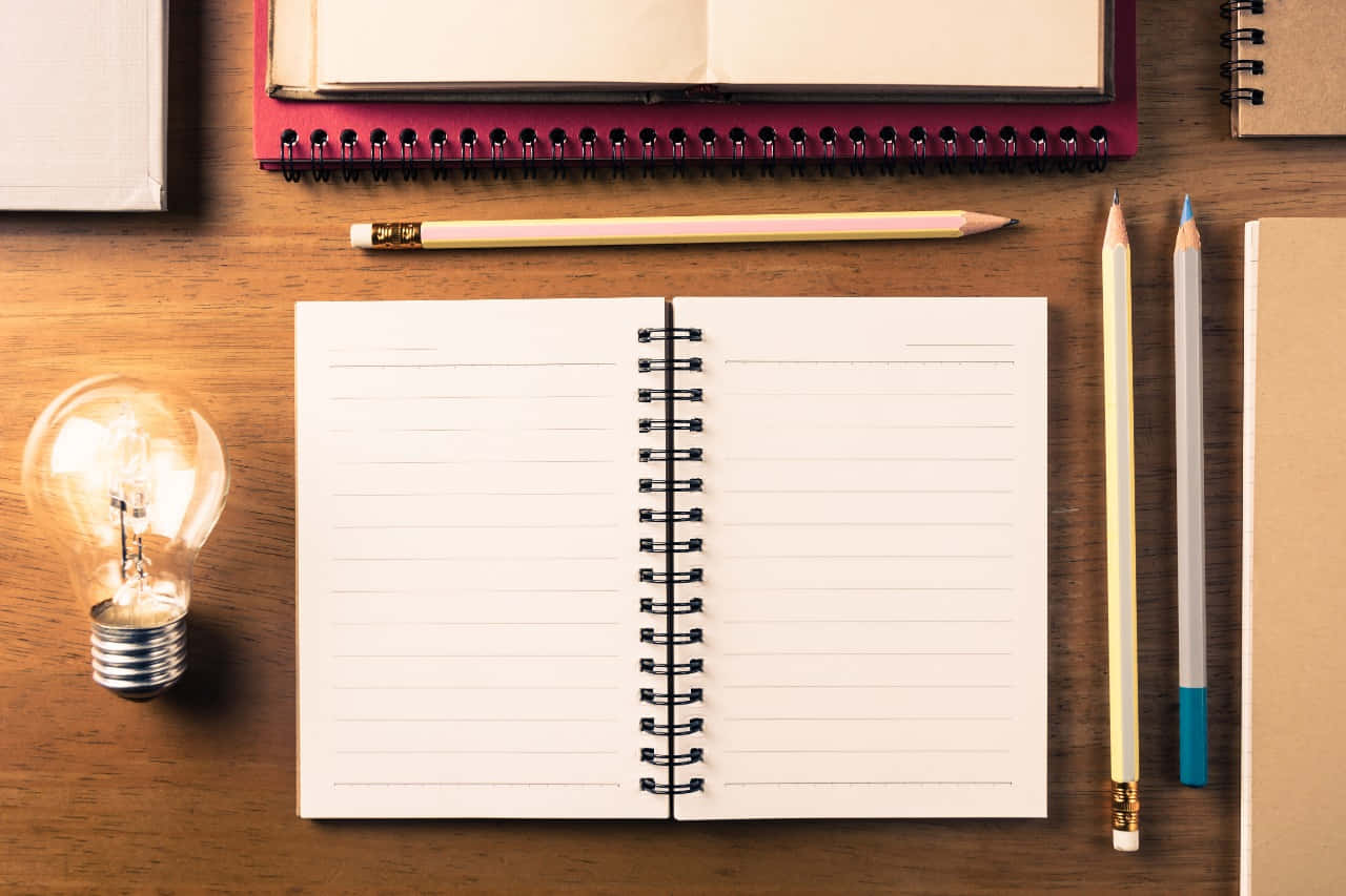 writing notebook, yellow lamp, wooden desk, HD Desktop Wallpaper