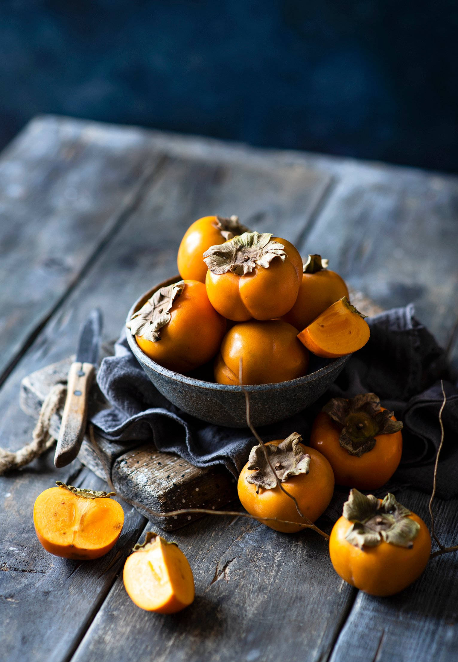 persimmon fruit, rustic bowl, weathered wooden table, Full HD Phone Wallpaper