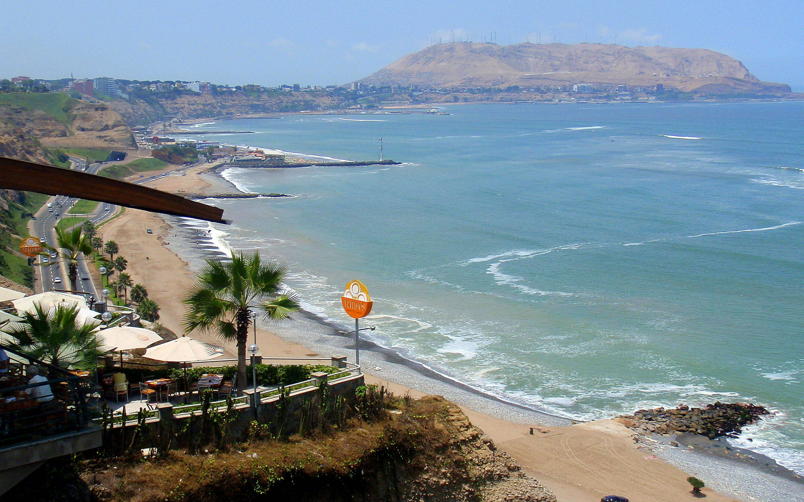 Peru, sunny beach shore, turquoise ocean waves, 2K Desktop Wallpaper