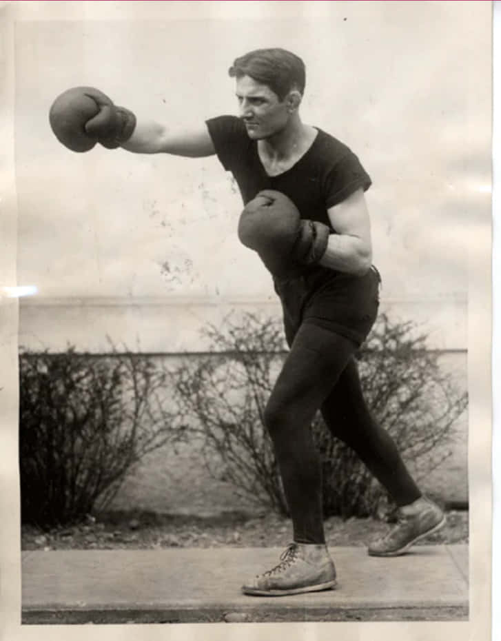 Pete Latzo, mid-punch stance, outdoors, SD Phone Wallpaper