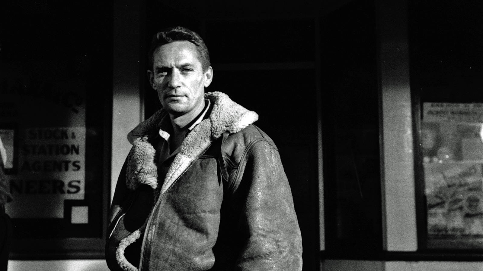 Peter Finch, sheepskin-lined leather jacket, dimly lit train station window, HD Desktop Wallpaper