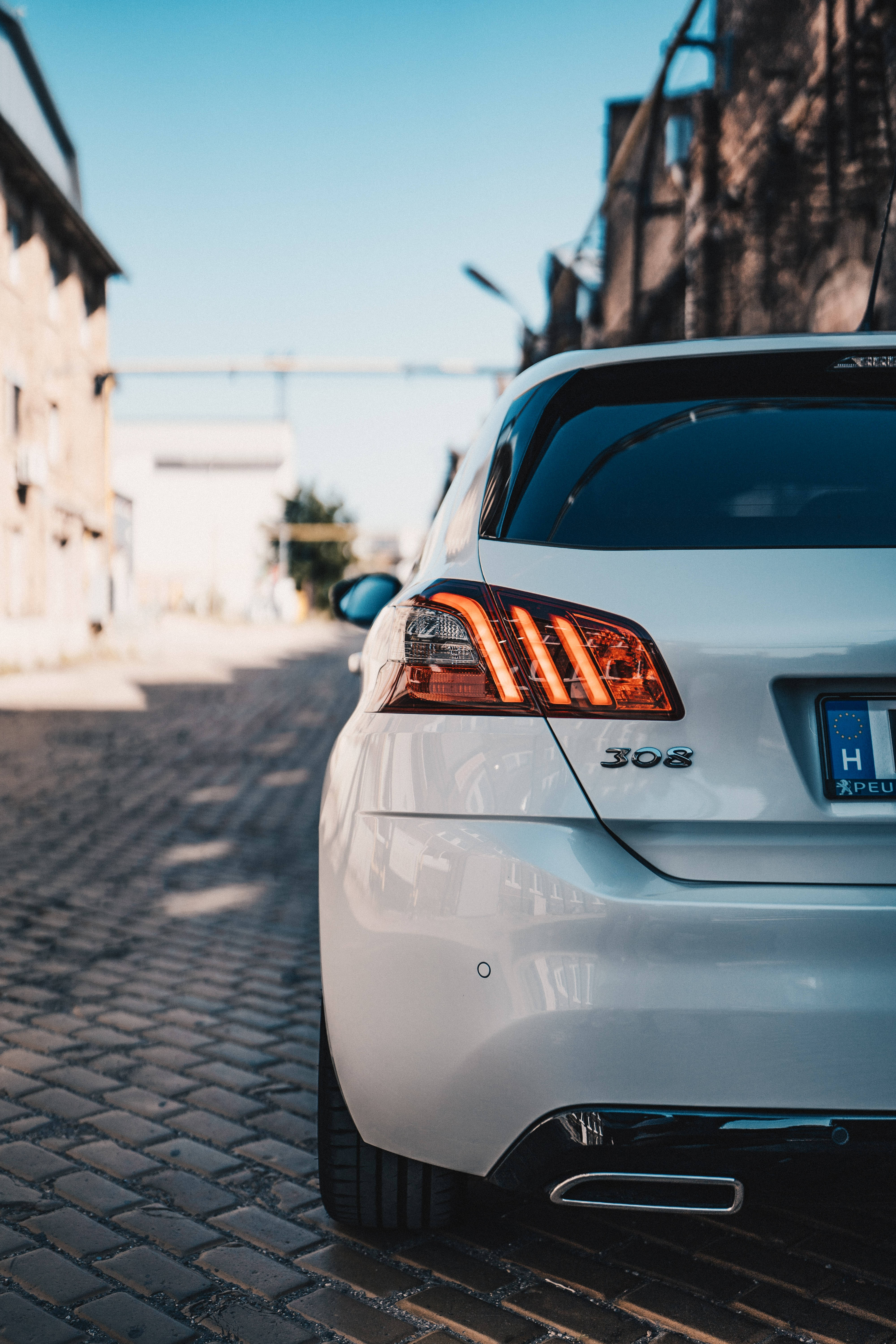 Peugeot 308, white, sunlit cobblestone street, 5K Phone Wallpaper