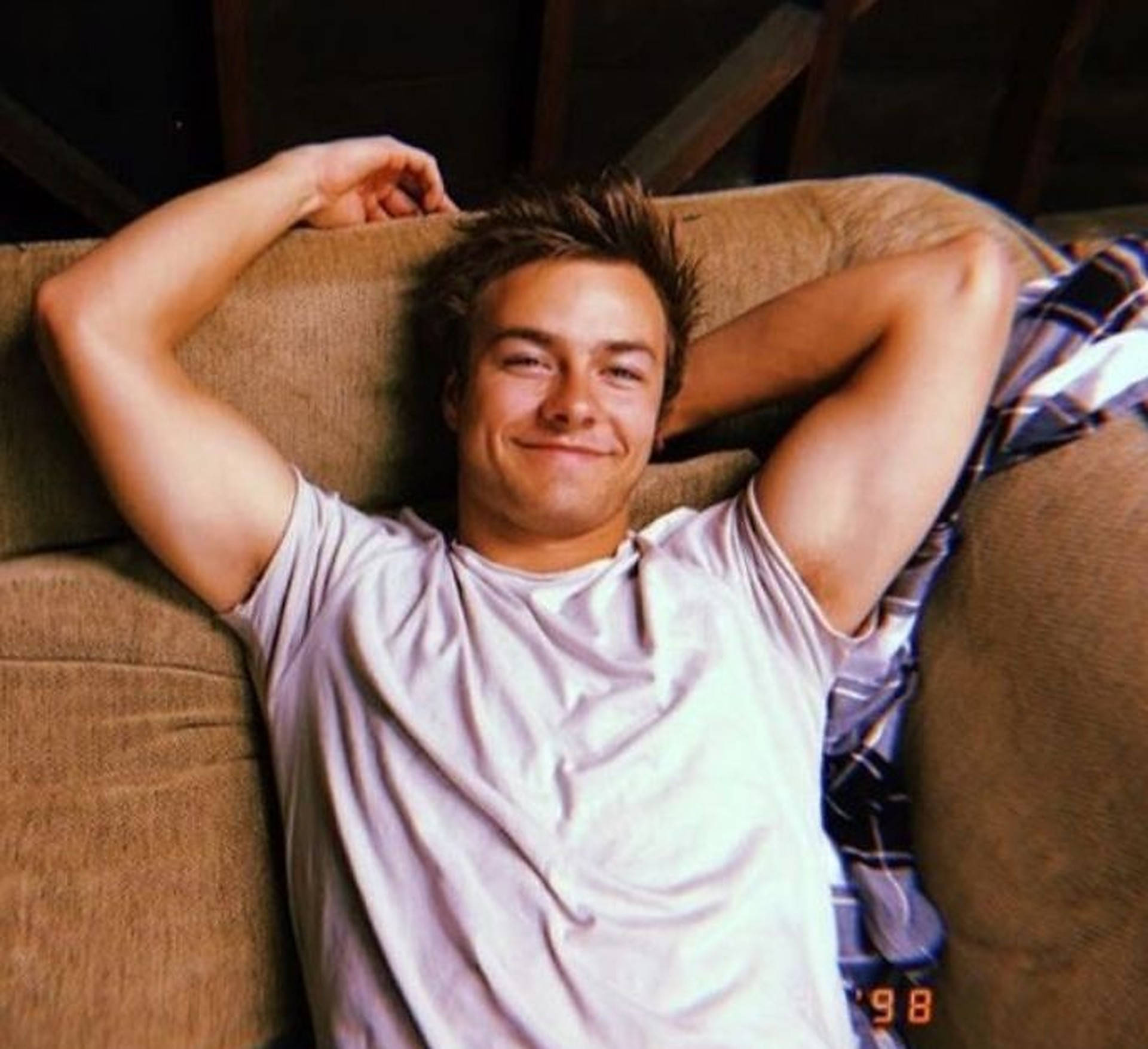 Peyton Meyer, tousled hair, brown couch, Full HD Desktop Wallpaper