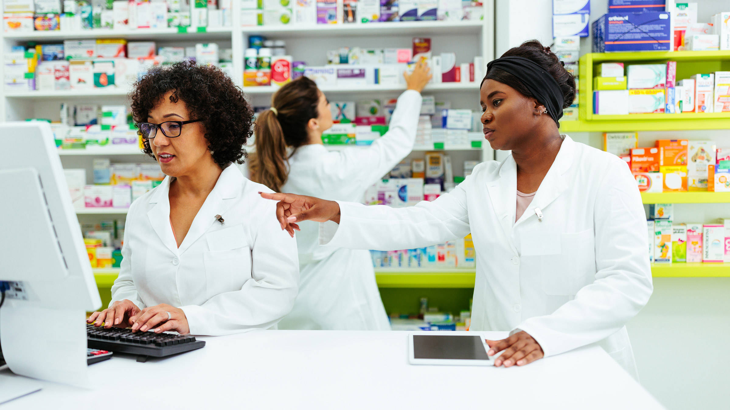 pharmacy counter, white coats, shelves of colorful medications, Full HD Desktop Wallpaper