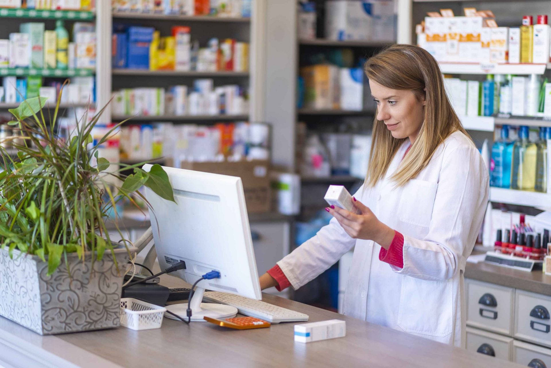 female pharmacist, white coat, medication box, Full HD Desktop Wallpaper