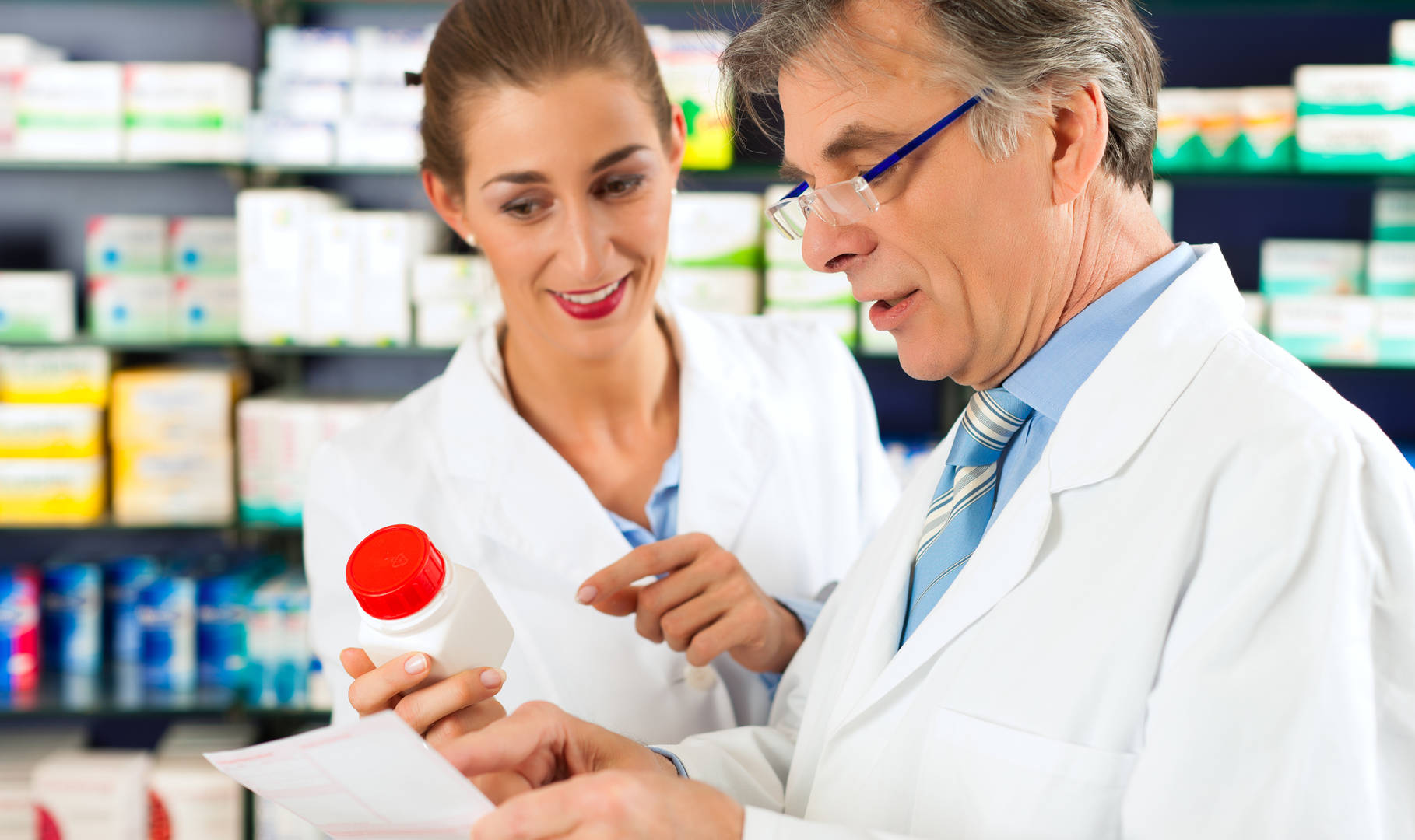 female pharmacist, older male customer, well-lit pharmacy aisle, HD Desktop Wallpaper