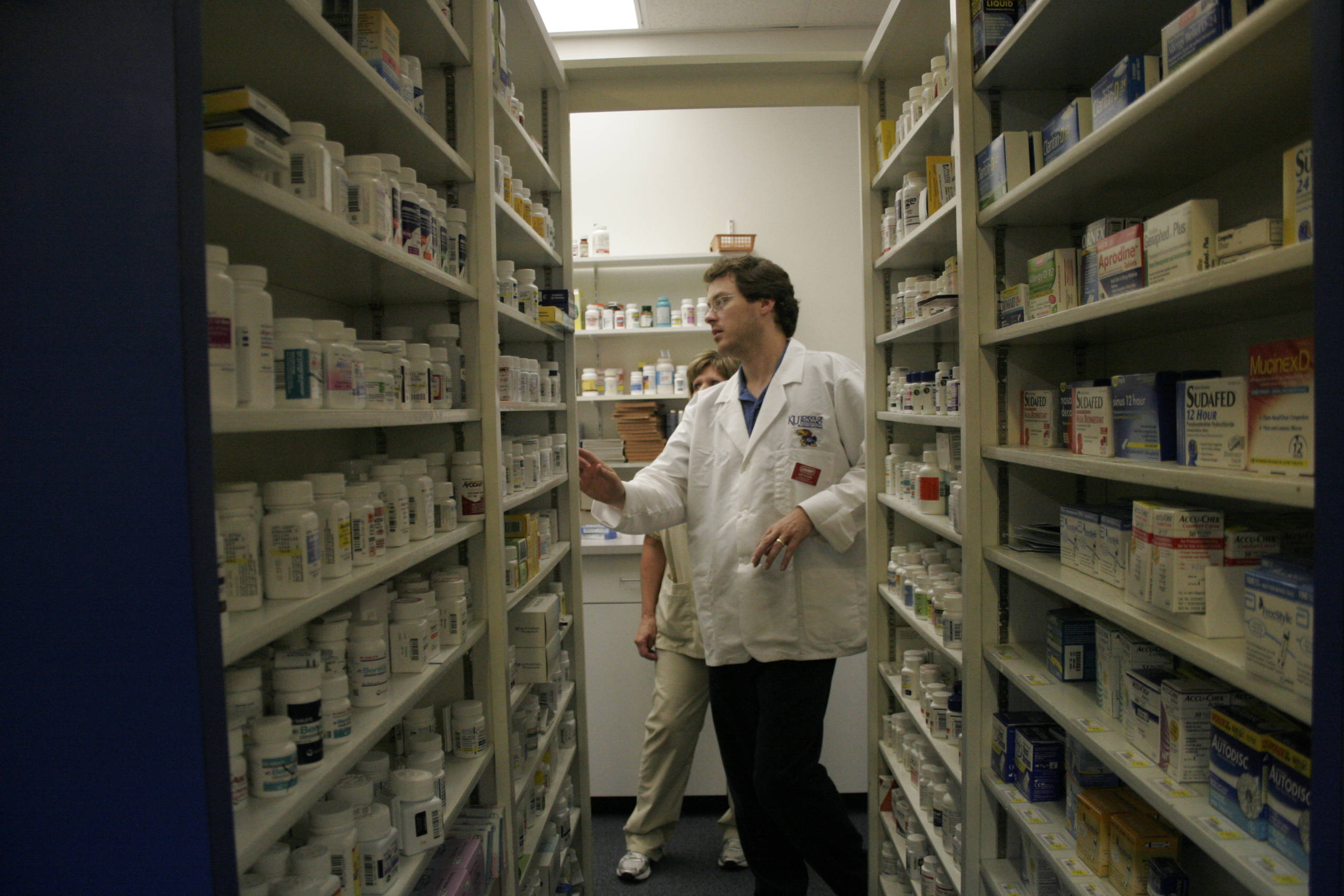 pharmacist, white coat, medicine shelves, Full HD Desktop Wallpaper