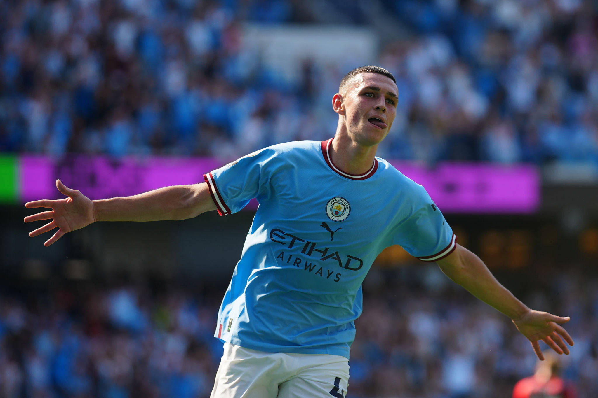 Phil Foden, light blue Manchester City jersey, sunlit stadium pitch, Full HD Desktop Wallpaper