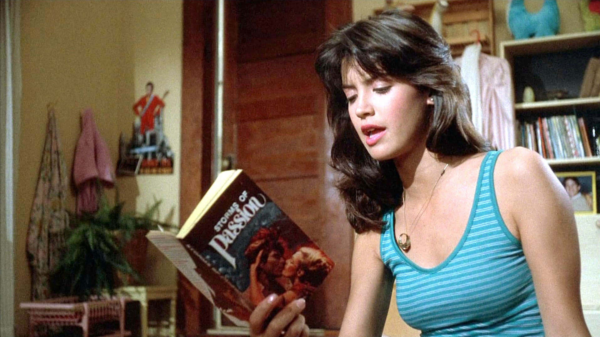 Phoebe Cates, blue striped tank top, book titled 'Stronger of Passion', Full HD Desktop Wallpaper