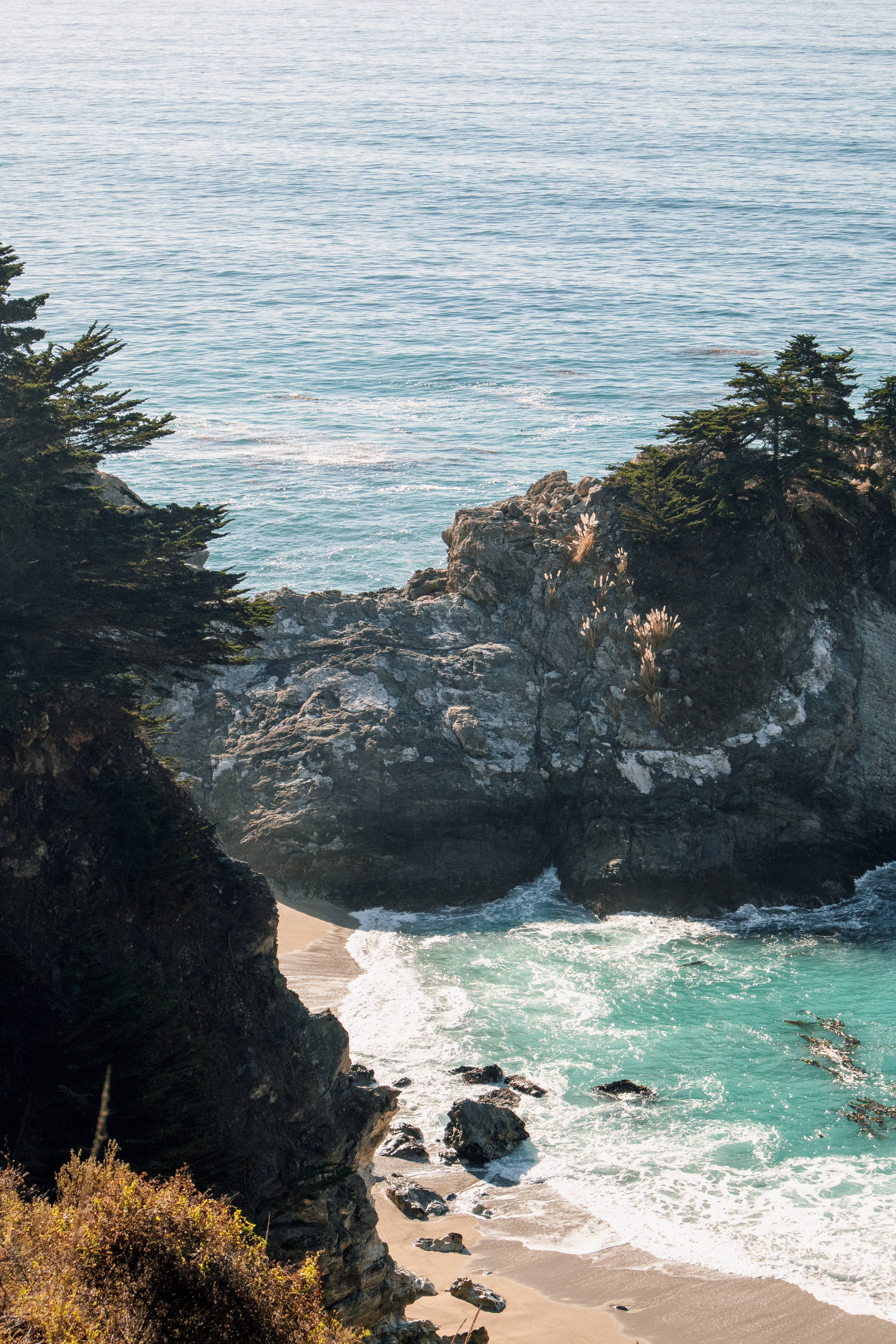 turquoise waves, rugged cliffs, secluded sandy cove, 4K Phone Wallpaper