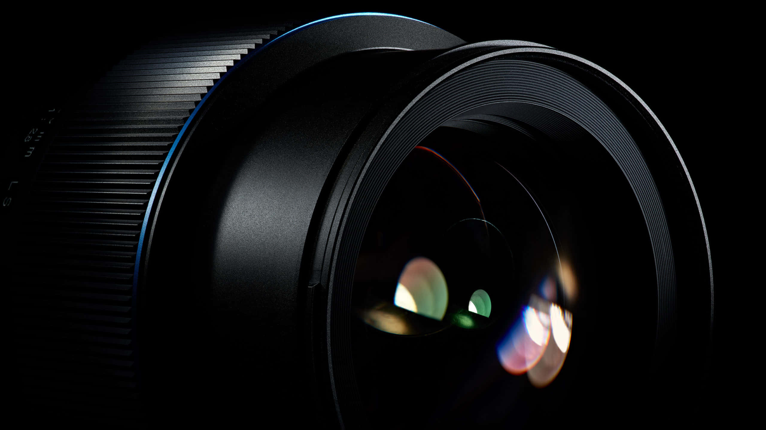camera lens, sleek black, colorful reflections, 2K Desktop Wallpaper