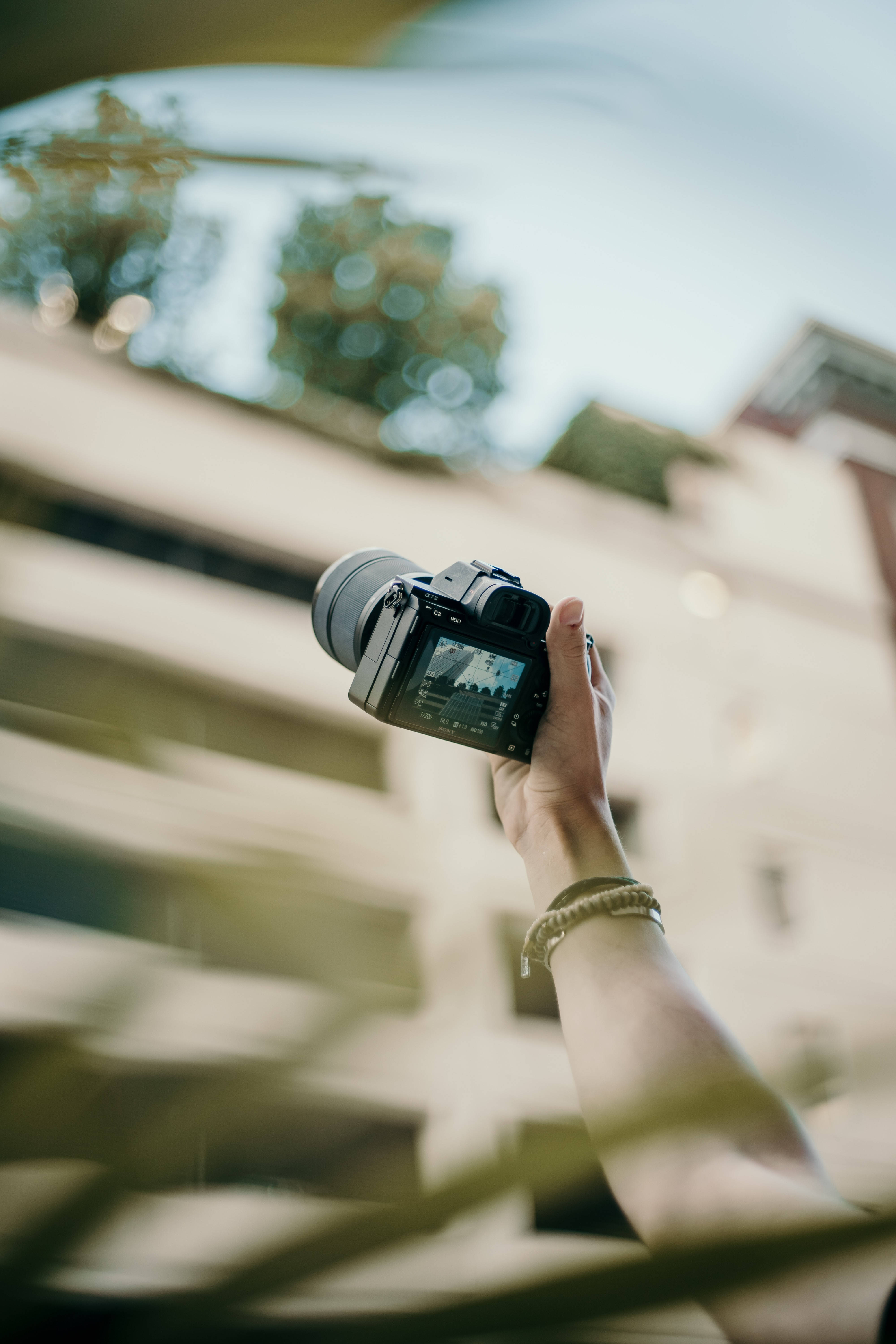 DSLR camera, urban scene, soft golden light, 5K Phone Wallpaper