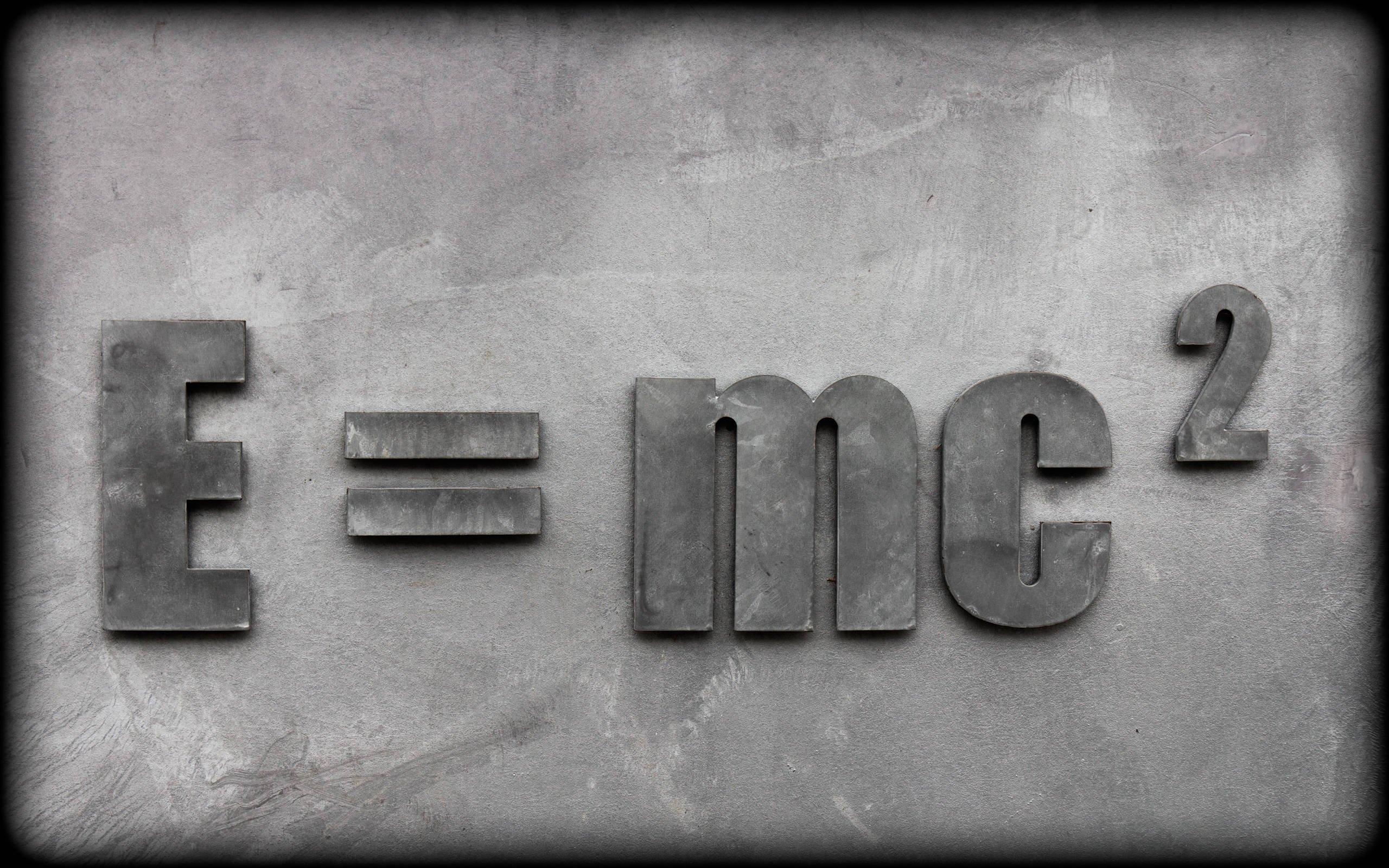 E equals mc squared, metallic, weathered gray concrete wall, 2K Desktop Wallpaper