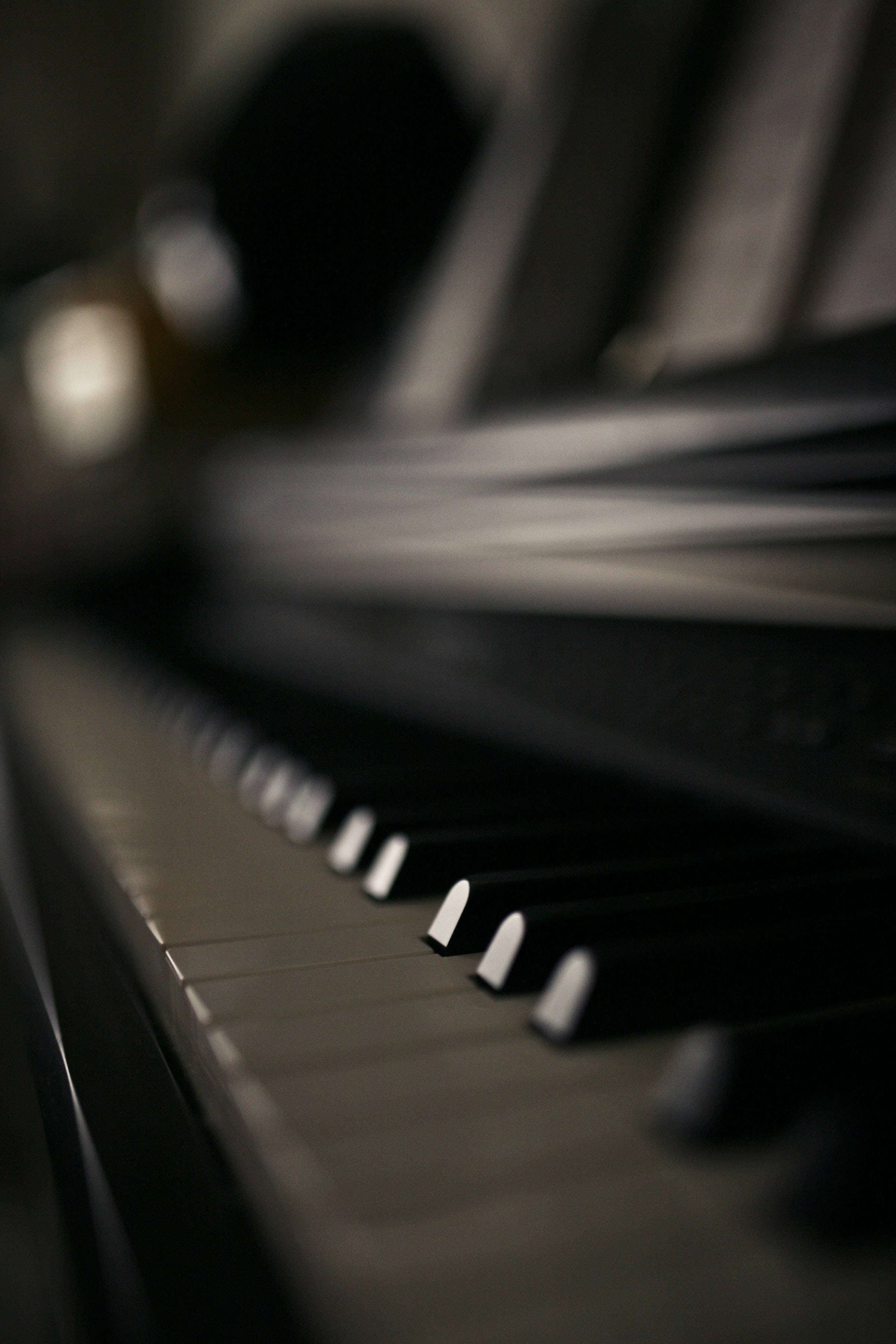 piano keys, macro focus photography, shallow depth of field, 2K Phone Wallpaper