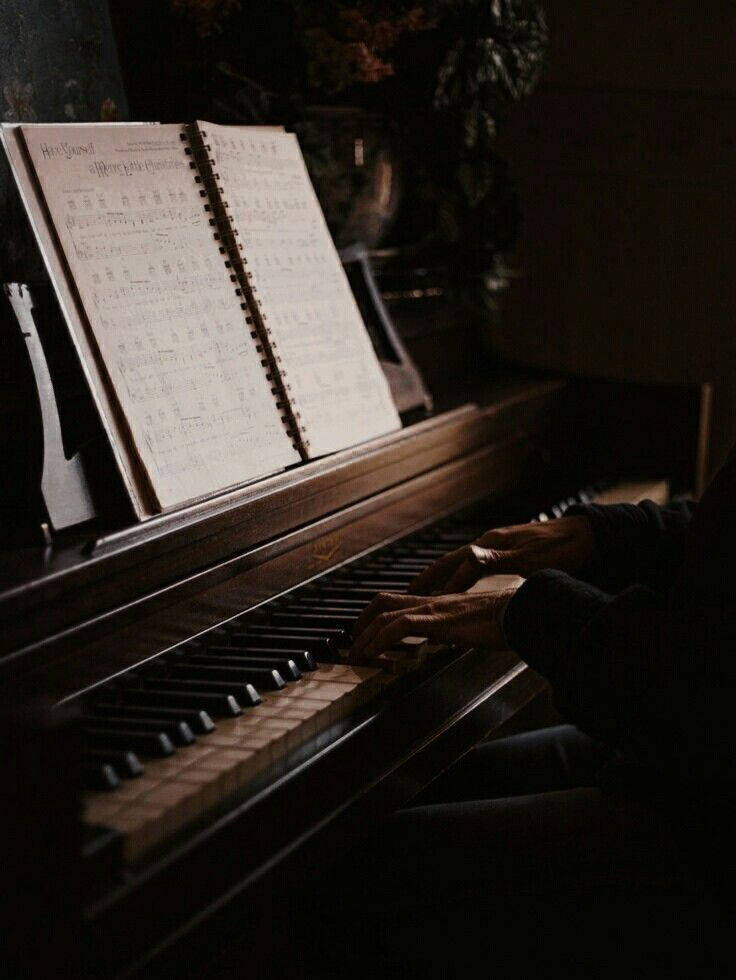 dark brown aesthetic piano, wooden piano, warm dim light, SD Phone Wallpaper
