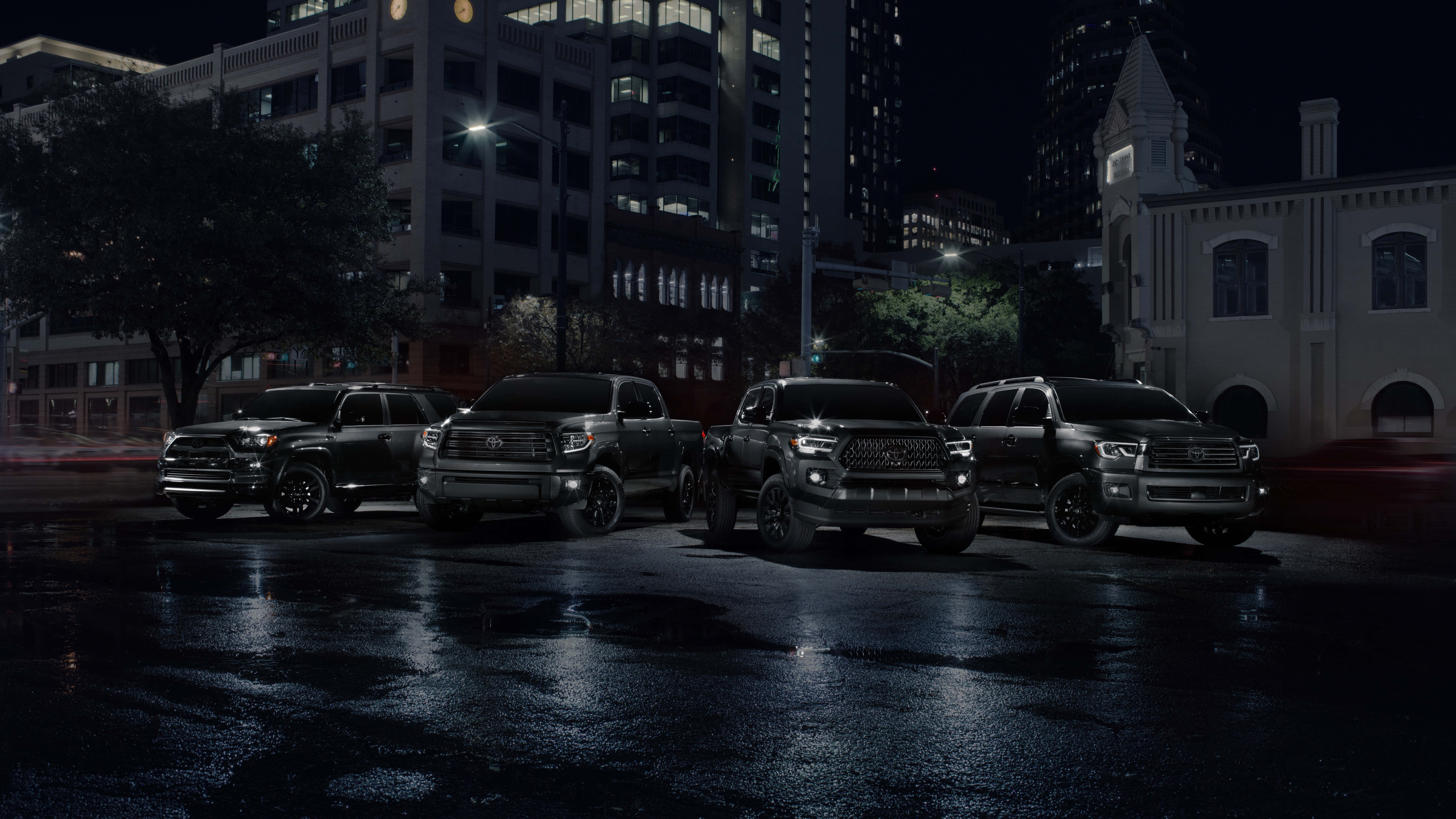 black tundra trucks, city lights, wet nighttime street, 8K Desktop Wallpaper