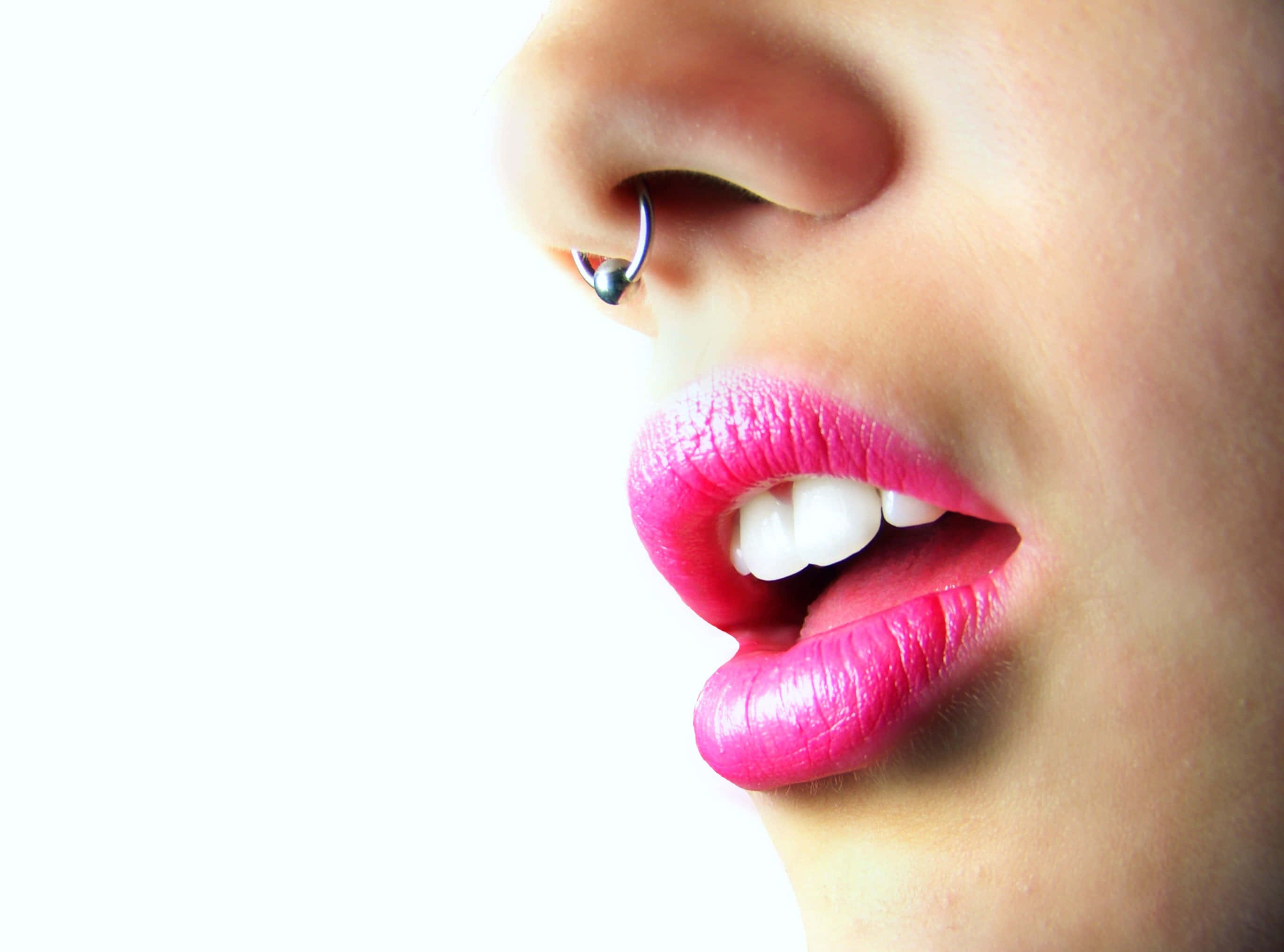 nose piercing, vibrant pink lipstick, stark white background, 2K Desktop Wallpaper
