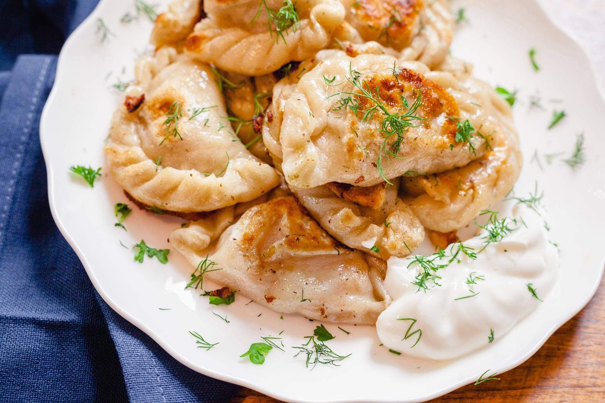 pierogi, crispy edges, fresh dill garnish, Full HD Desktop Wallpaper
