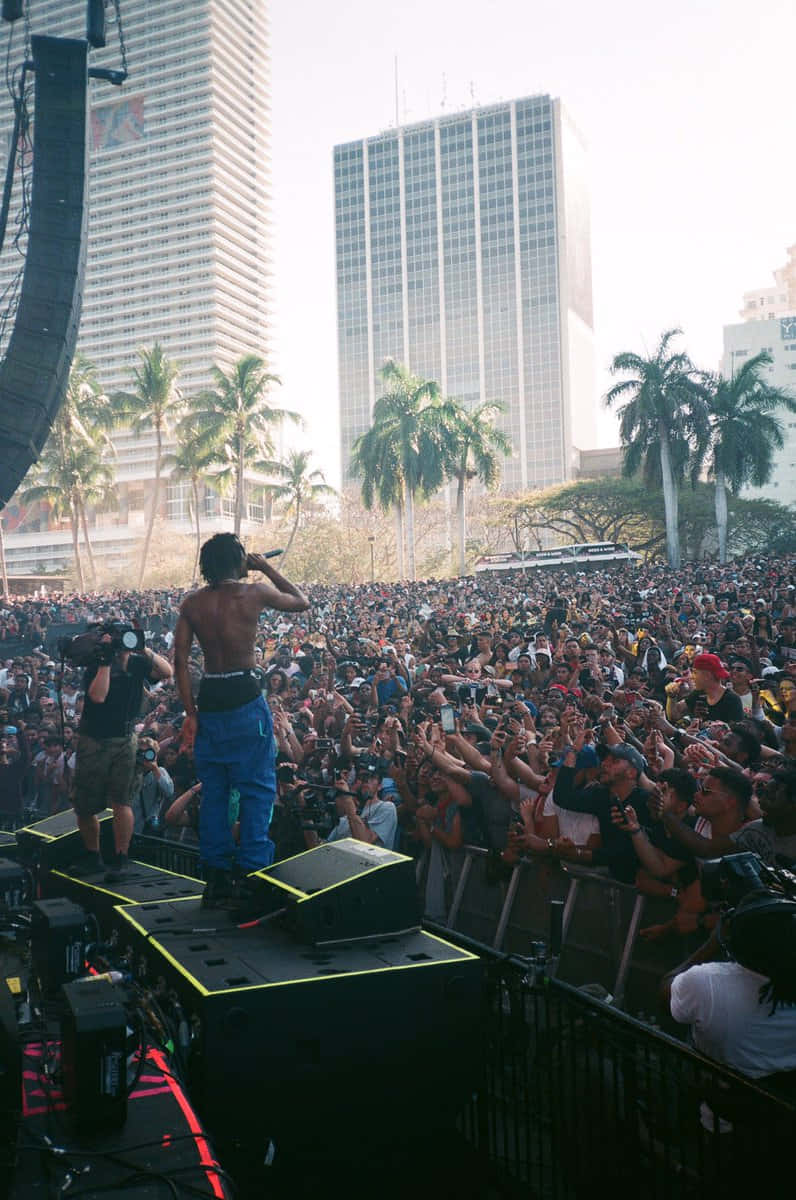 Pierre Bourne, glowing stage speakers, massive crowd, SD Phone Wallpaper