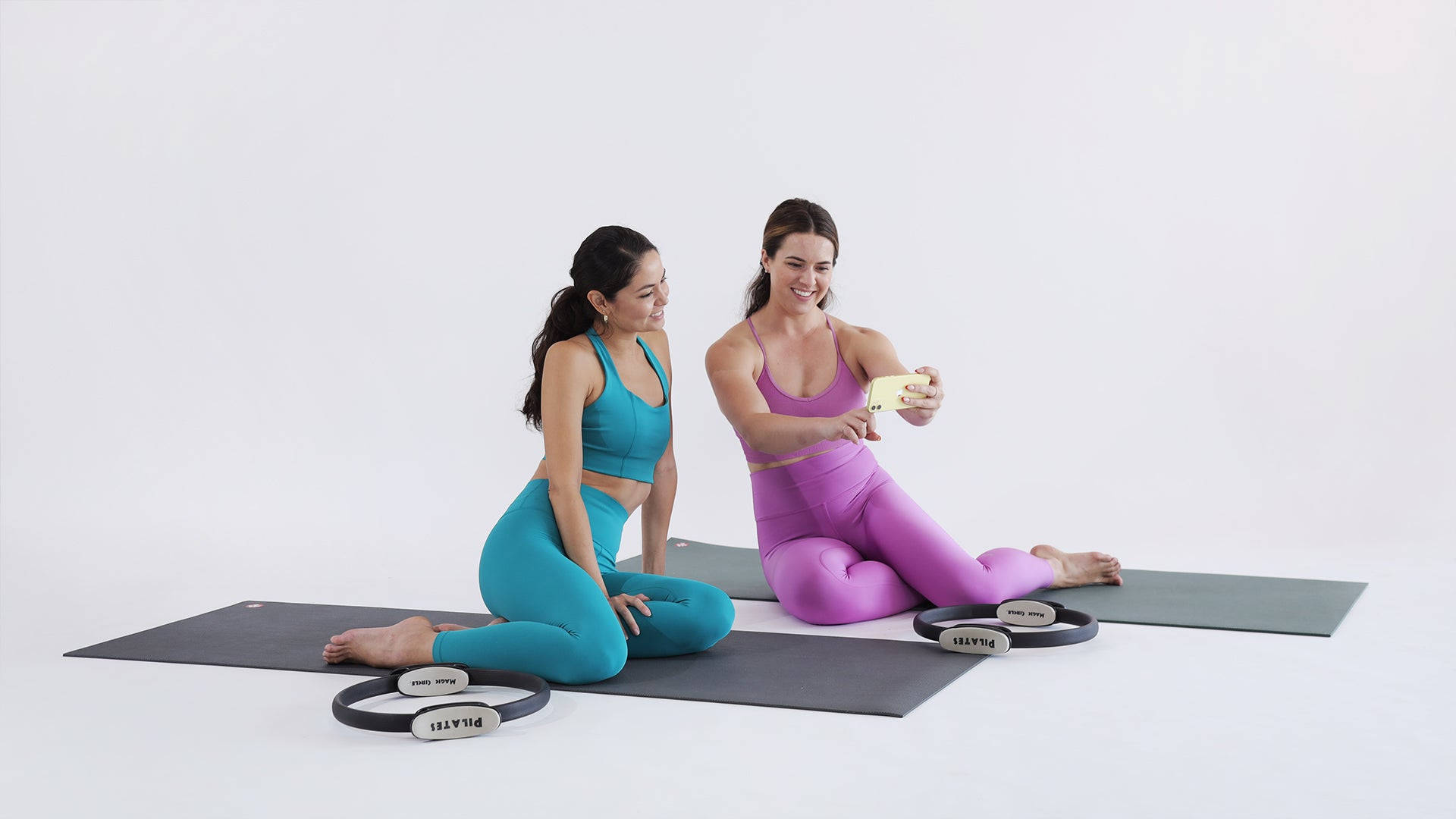 Pilates rings, yoga mats, bright workout gear, Full HD Desktop Wallpaper