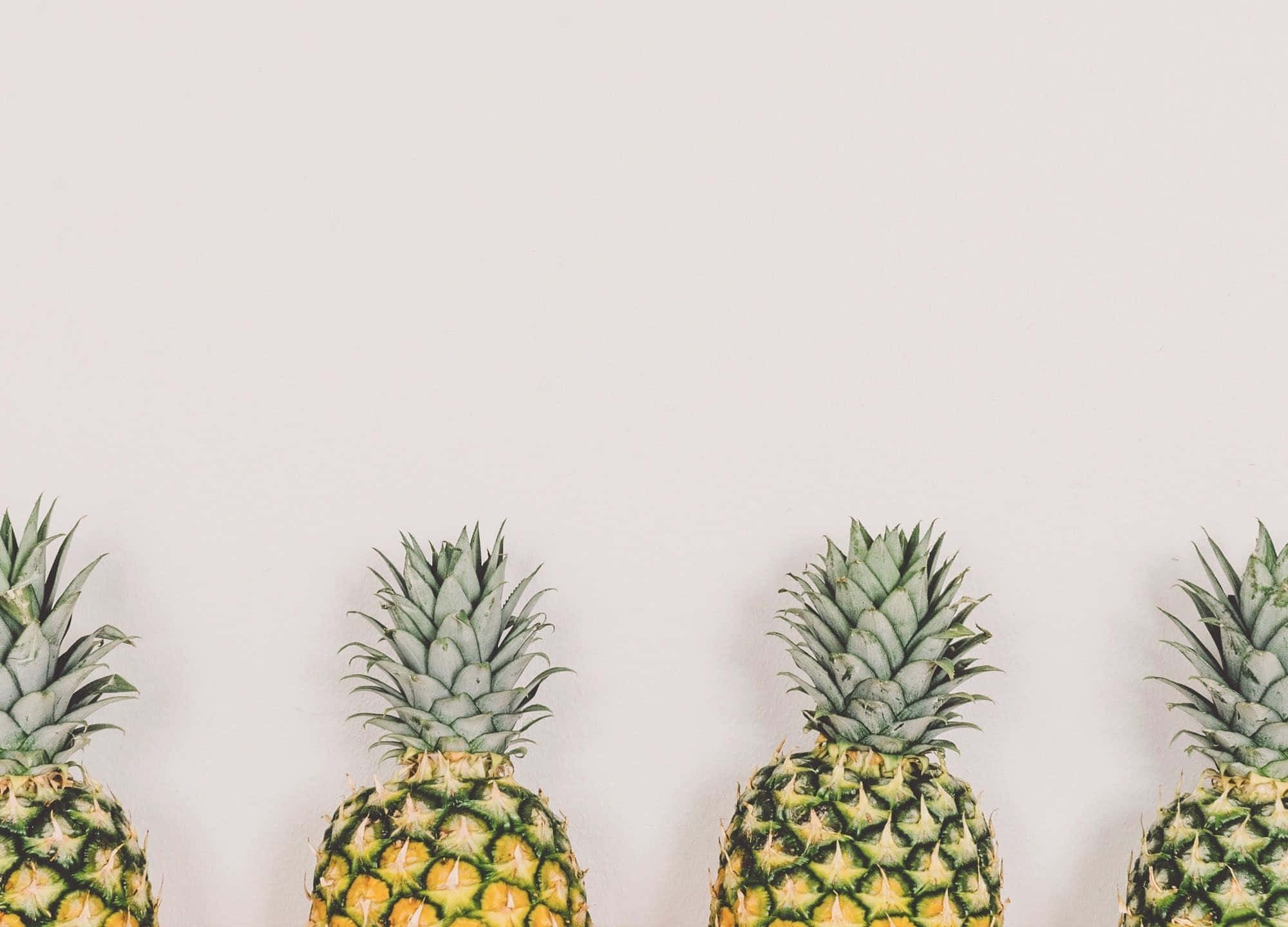 Pineapple Desktop, four ripe pineapples, spiky green crowns, Full HD Desktop Wallpaper