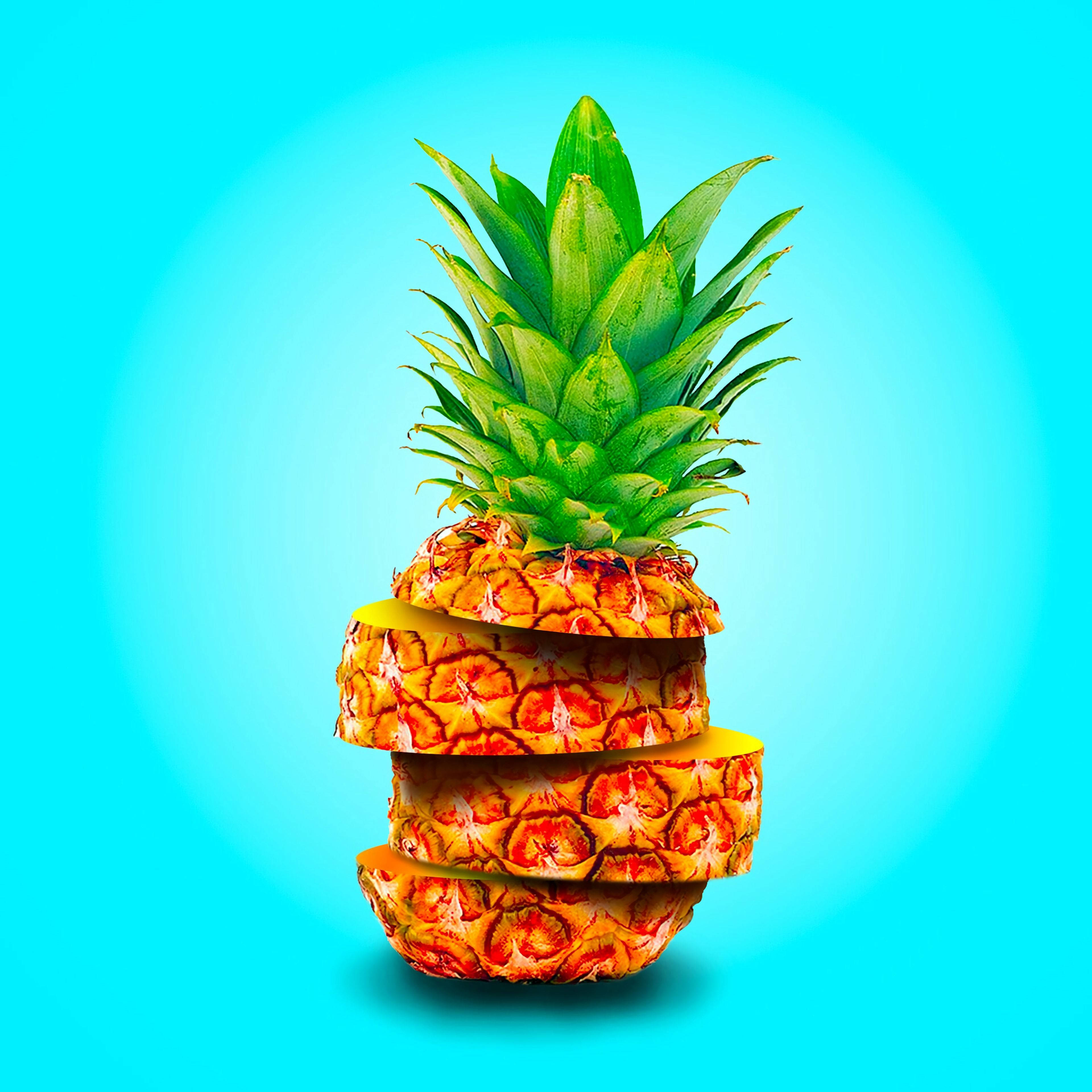 sliced and stacked pineapple, bright cyan gradient background, yellow slices, 4K Desktop Wallpaper