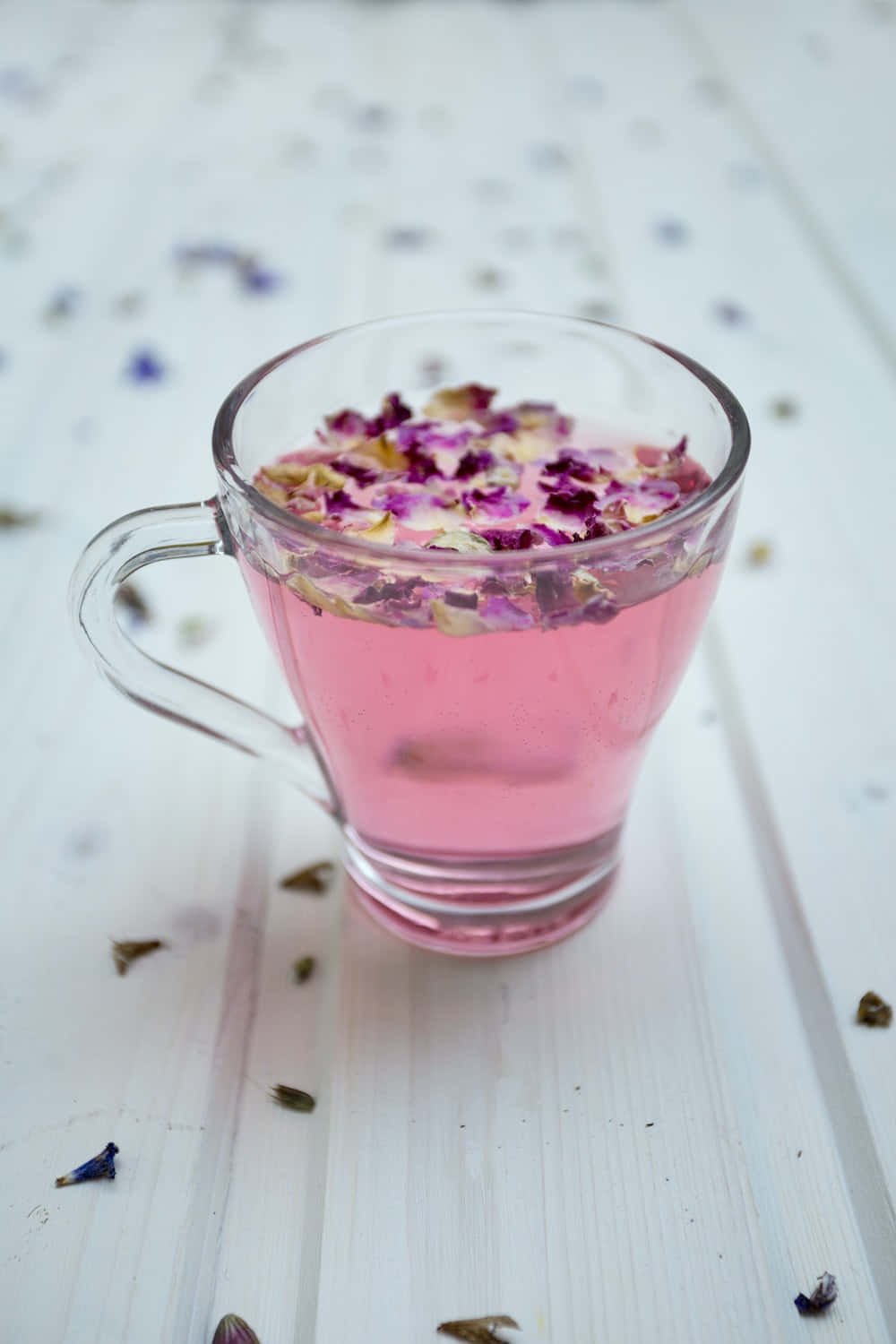 pink rose petal tea, clear glass mug, white wooden surface, HD Phone Wallpaper